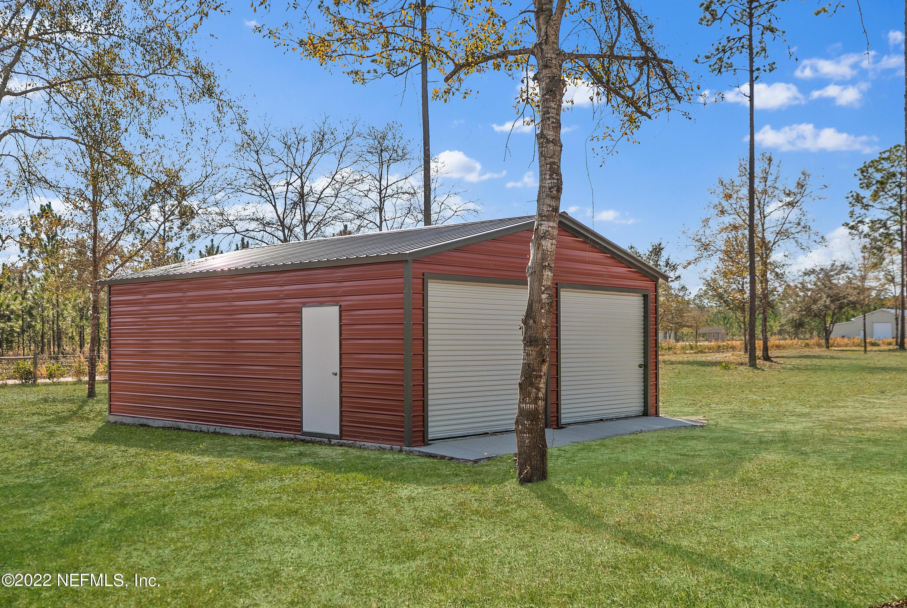 14394 Bob Burnsed Road Glen St. Mary, FL 32040 - Photo 28 of 36 a view of a backyard
