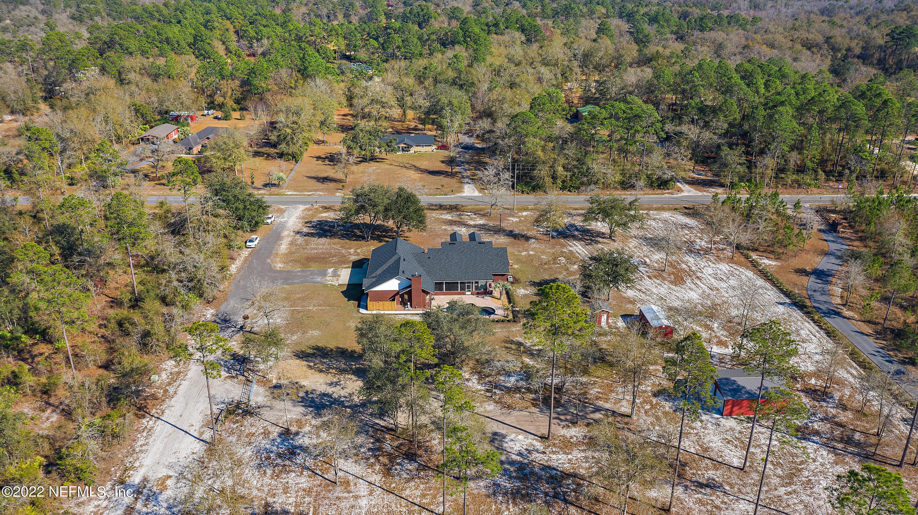 14394 Bob Burnsed Road Glen St. Mary, FL 32040 - Photo 32 of 36 a view of a yard with plants