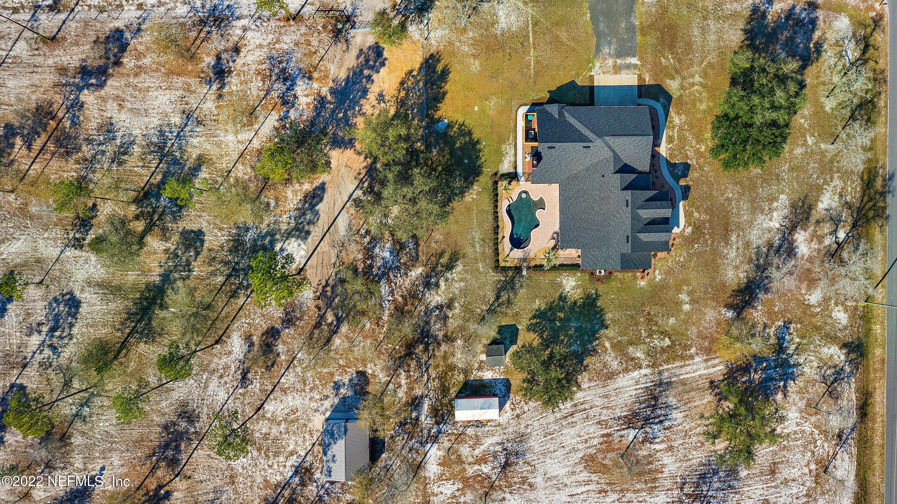14394 Bob Burnsed Road Glen St. Mary, FL 32040 - Photo 34 of 36 a aerial view of a house with a yard