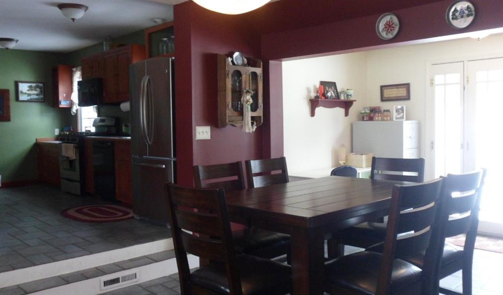 219 Easton Road Hermitage, PA 16148 - Photo 3 of 22 Dining room has step up to kitchen