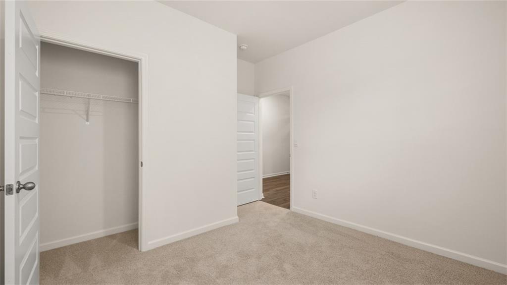 644 Whitman Lane Stockbridge, GA 30281 - Photo 30 of 43 a view of an empty room