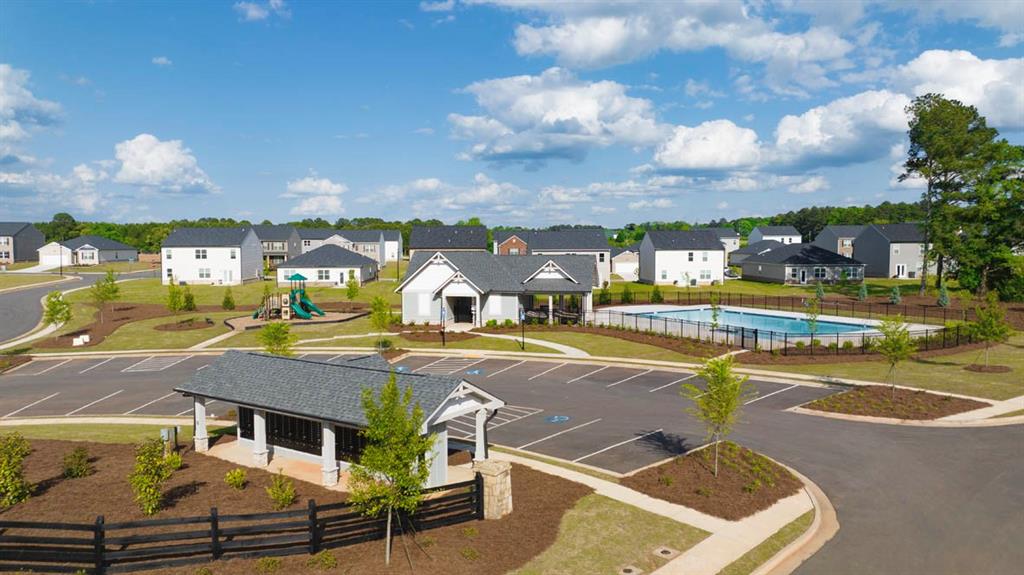644 Whitman Lane Stockbridge, GA 30281 - Photo 43 of 43 a view of a swimming pool with outdoor seating and city view