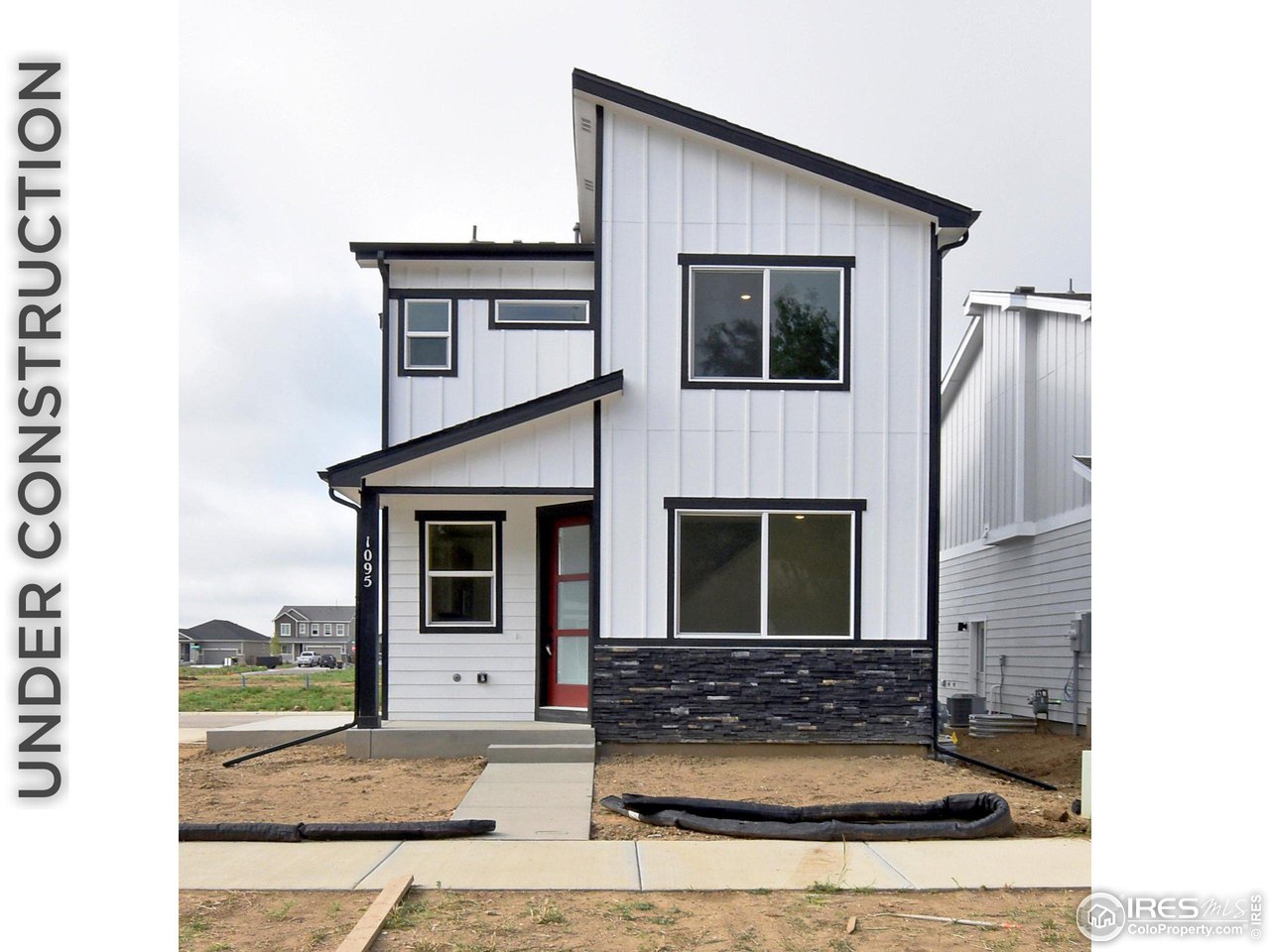 268 East 4th Street Berthoud, CO 80513 - Photo 1 of 39 a front view of a house with windows