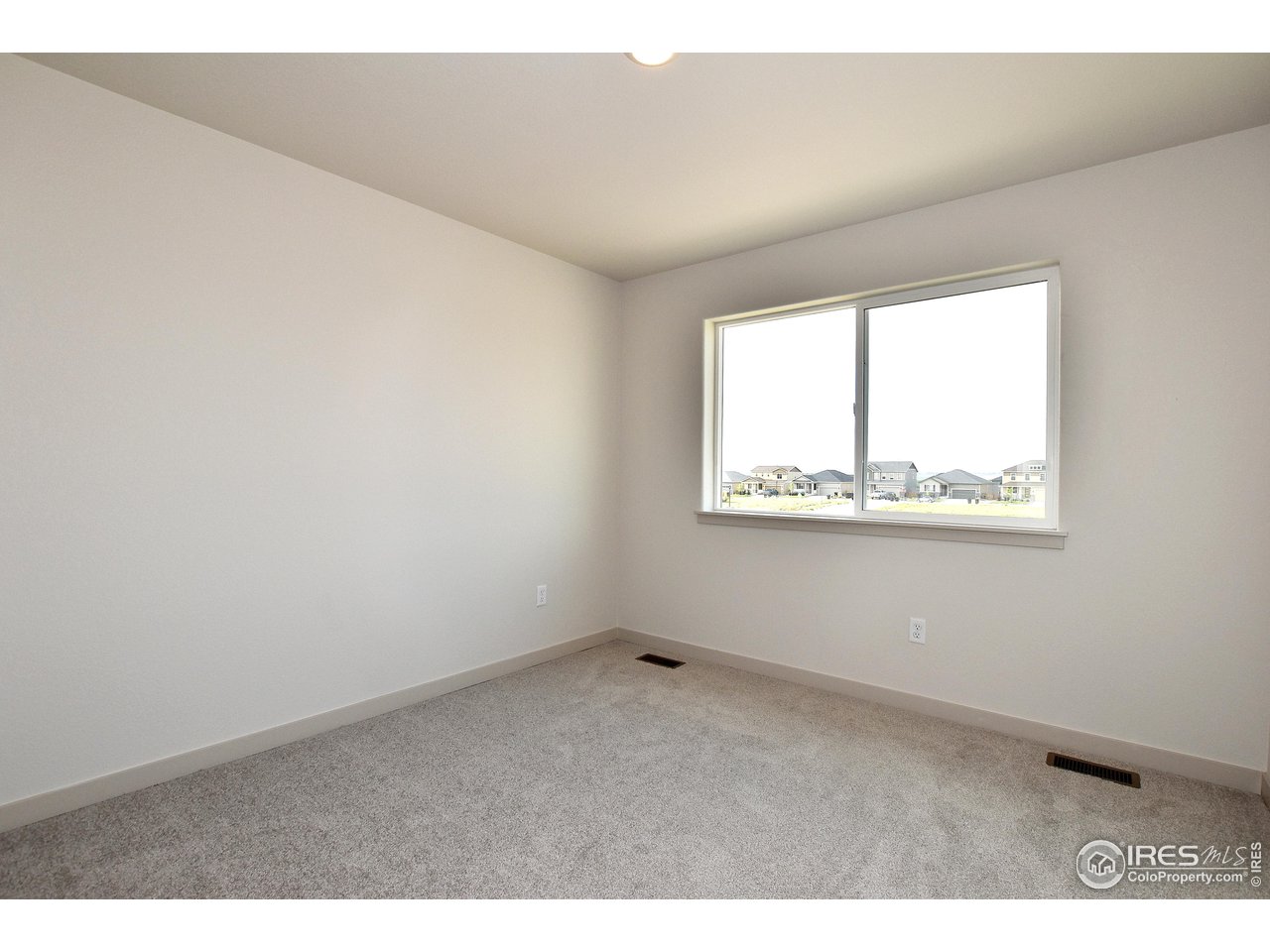 268 East 4th Street Berthoud, CO 80513 - Photo 31 of 39 an empty room with a window