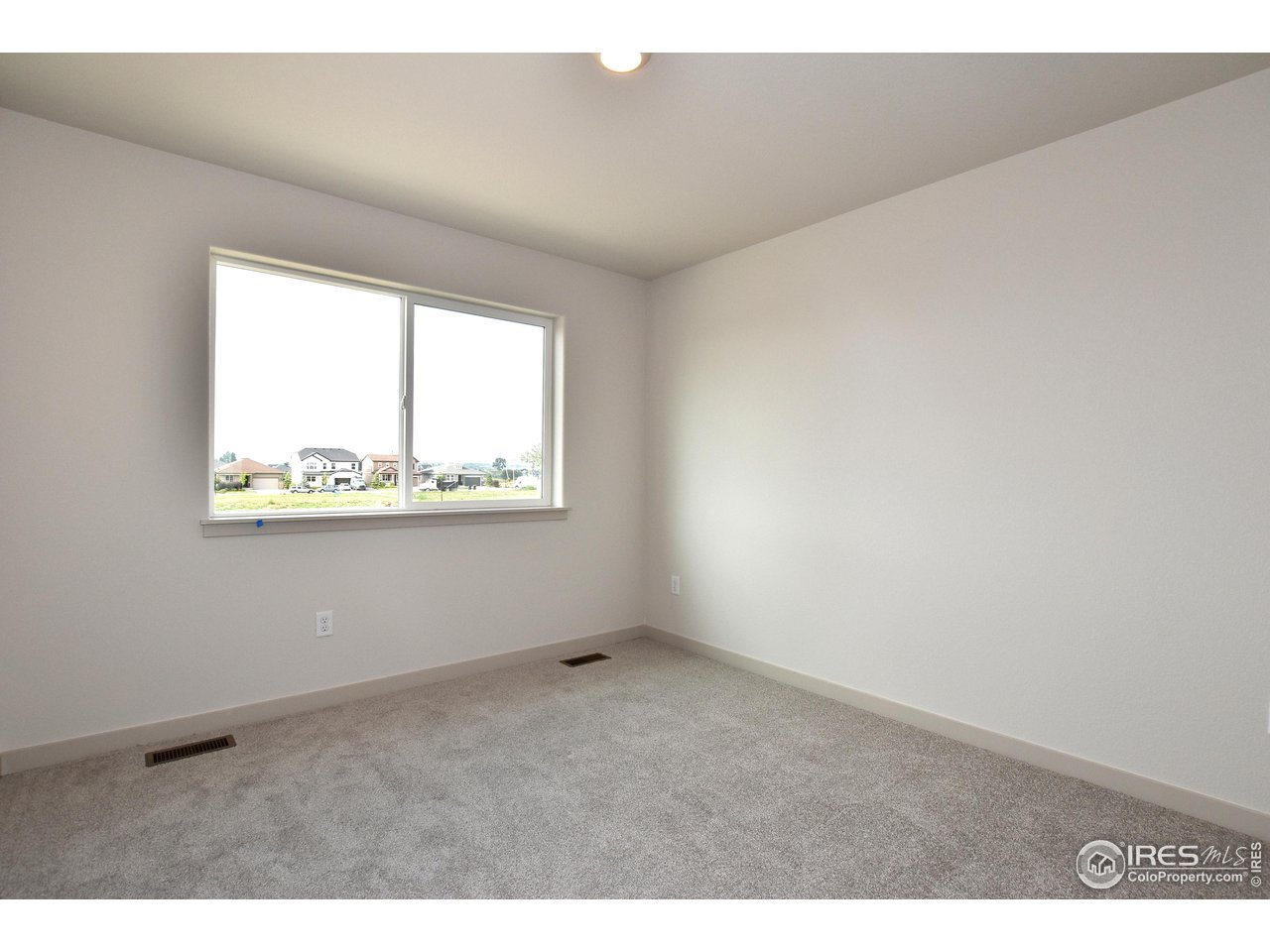268 East 4th Street Berthoud, CO 80513 - Photo 32 of 39 an empty room with a window