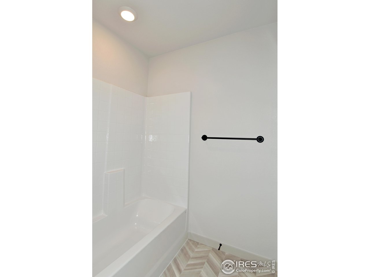 268 East 4th Street Berthoud, CO 80513 - Photo 34 of 39 a bathroom with a shower and a toilet