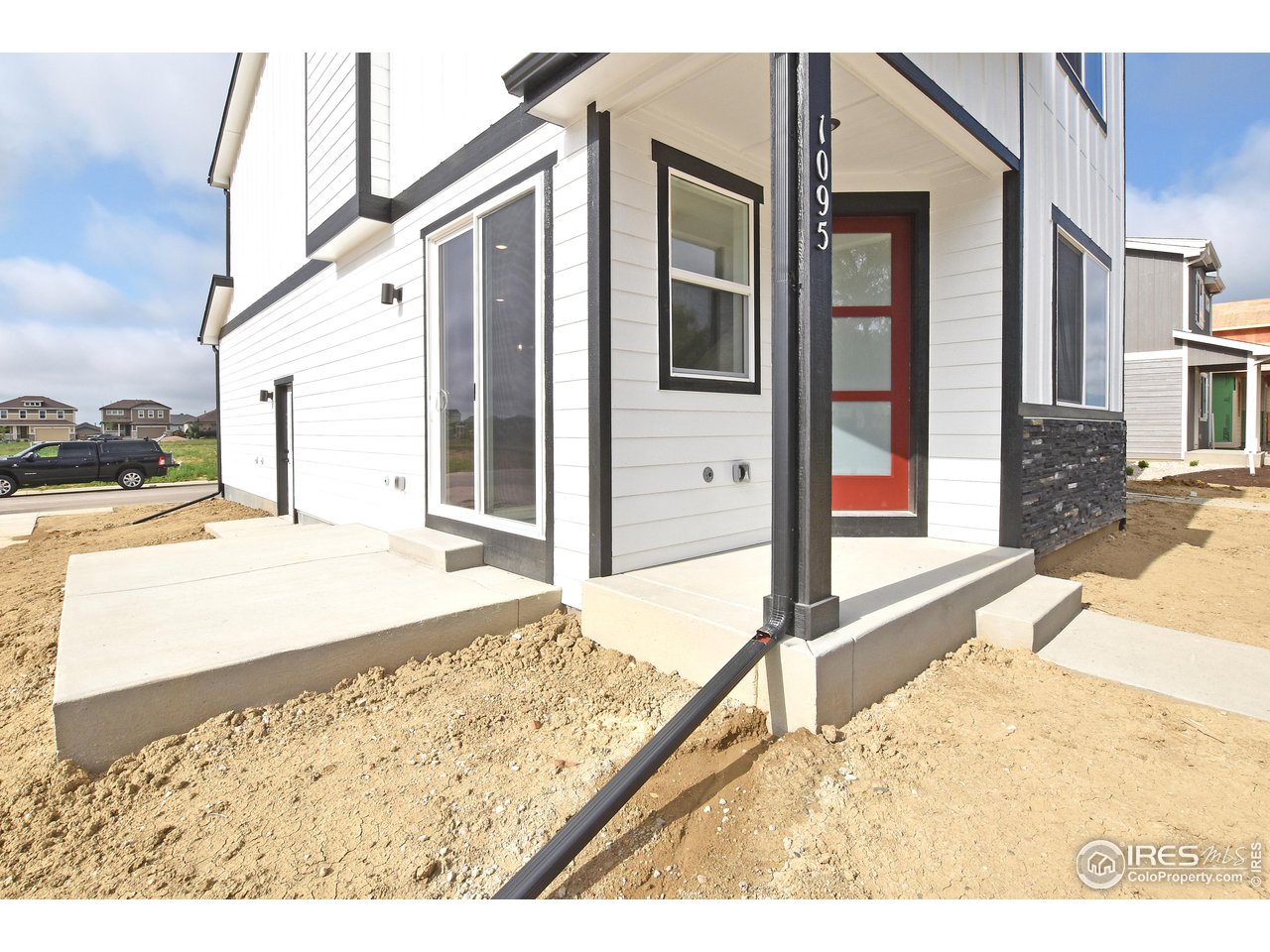268 East 4th Street Berthoud, CO 80513 - Photo 4 of 39 a view of a house with a outdoor space
