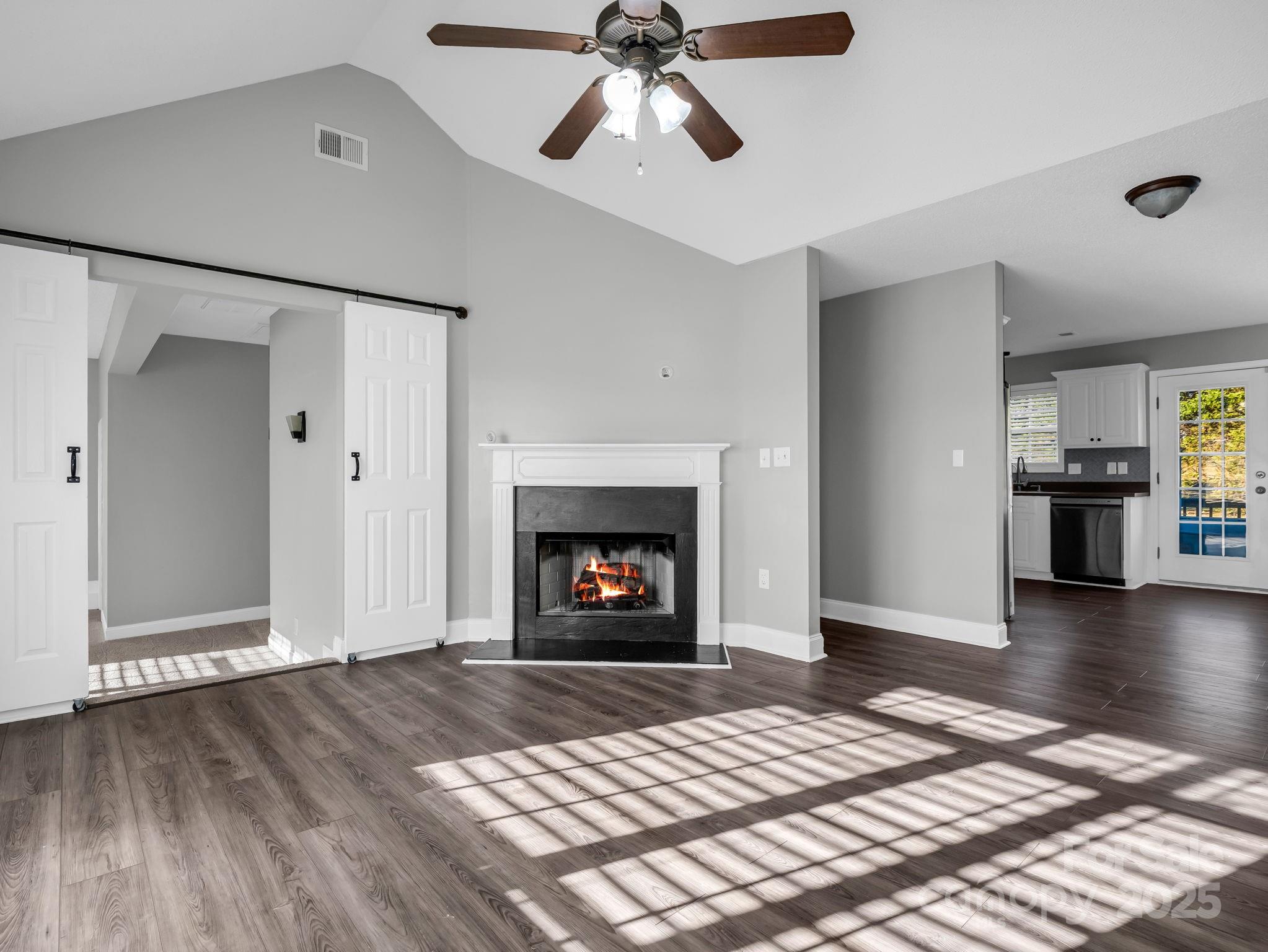 340 Sarratt Creek Road Gaffney, SC 29341 - Photo 17 of 46 a bedroom with a bed and a fireplace