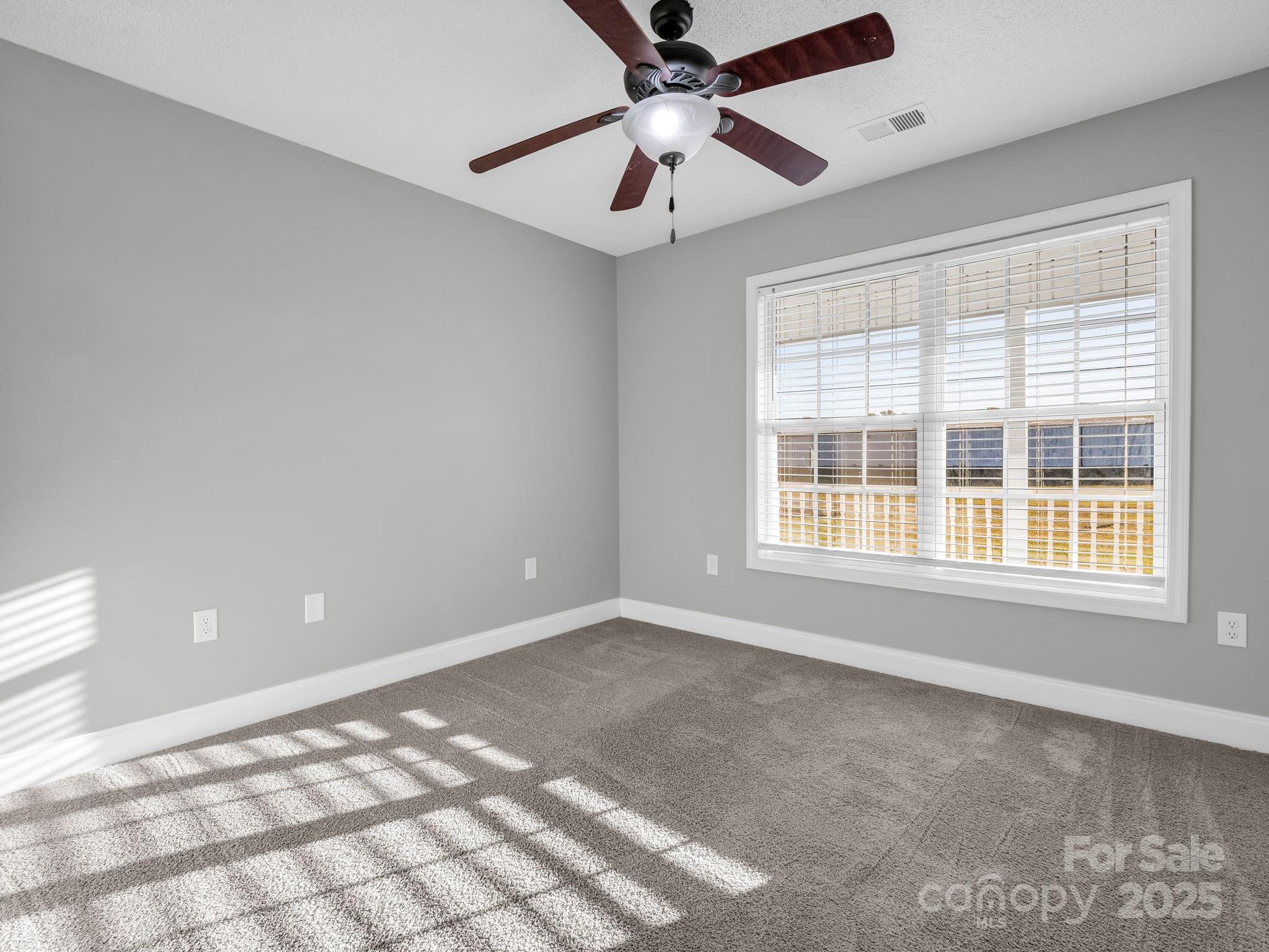 340 Sarratt Creek Road Gaffney, SC 29341 - Photo 23 of 46 a view of an empty room with a window