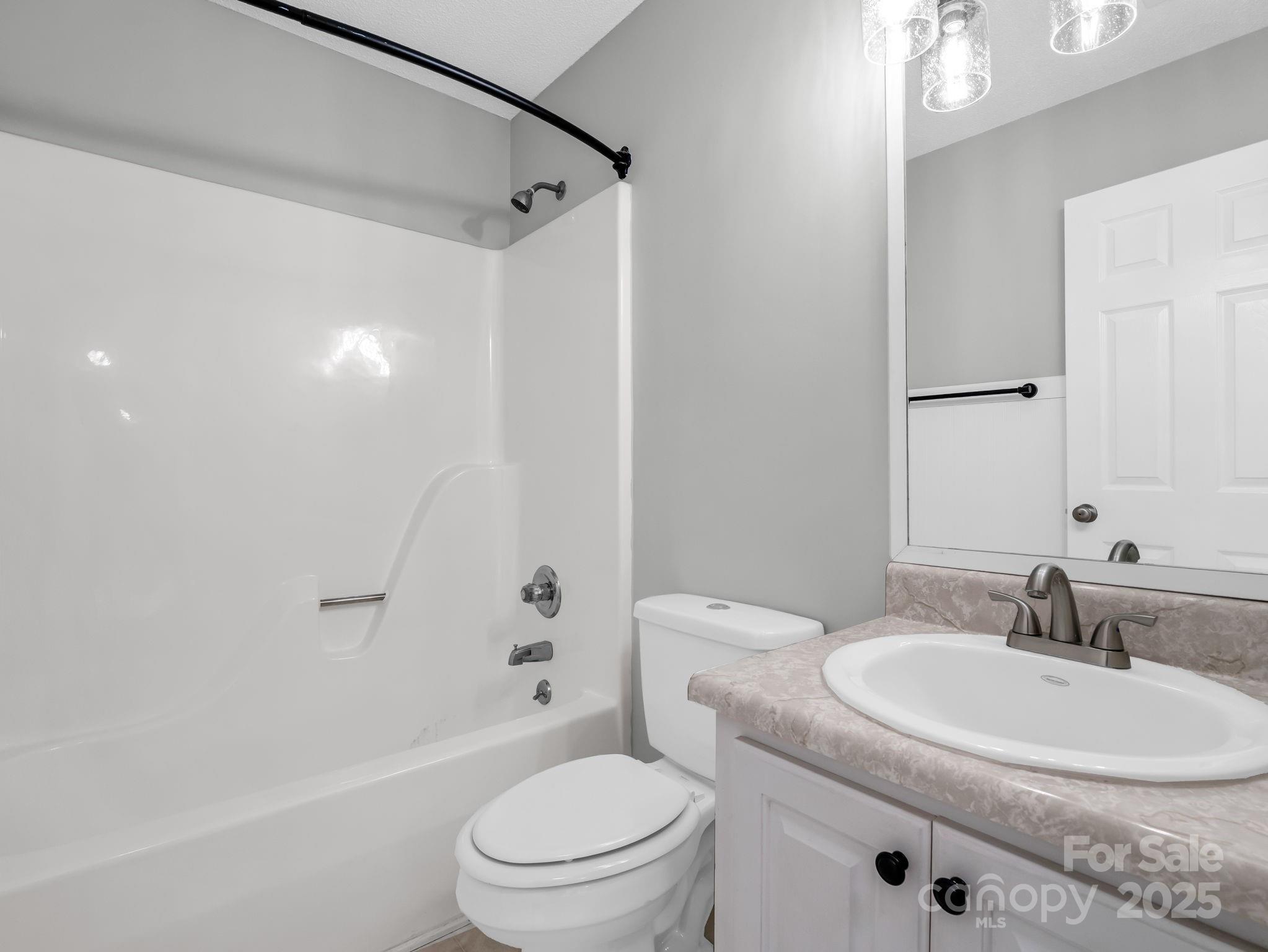 340 Sarratt Creek Road Gaffney, SC 29341 - Photo 24 of 46 a bathroom with a sink a toilet and shower