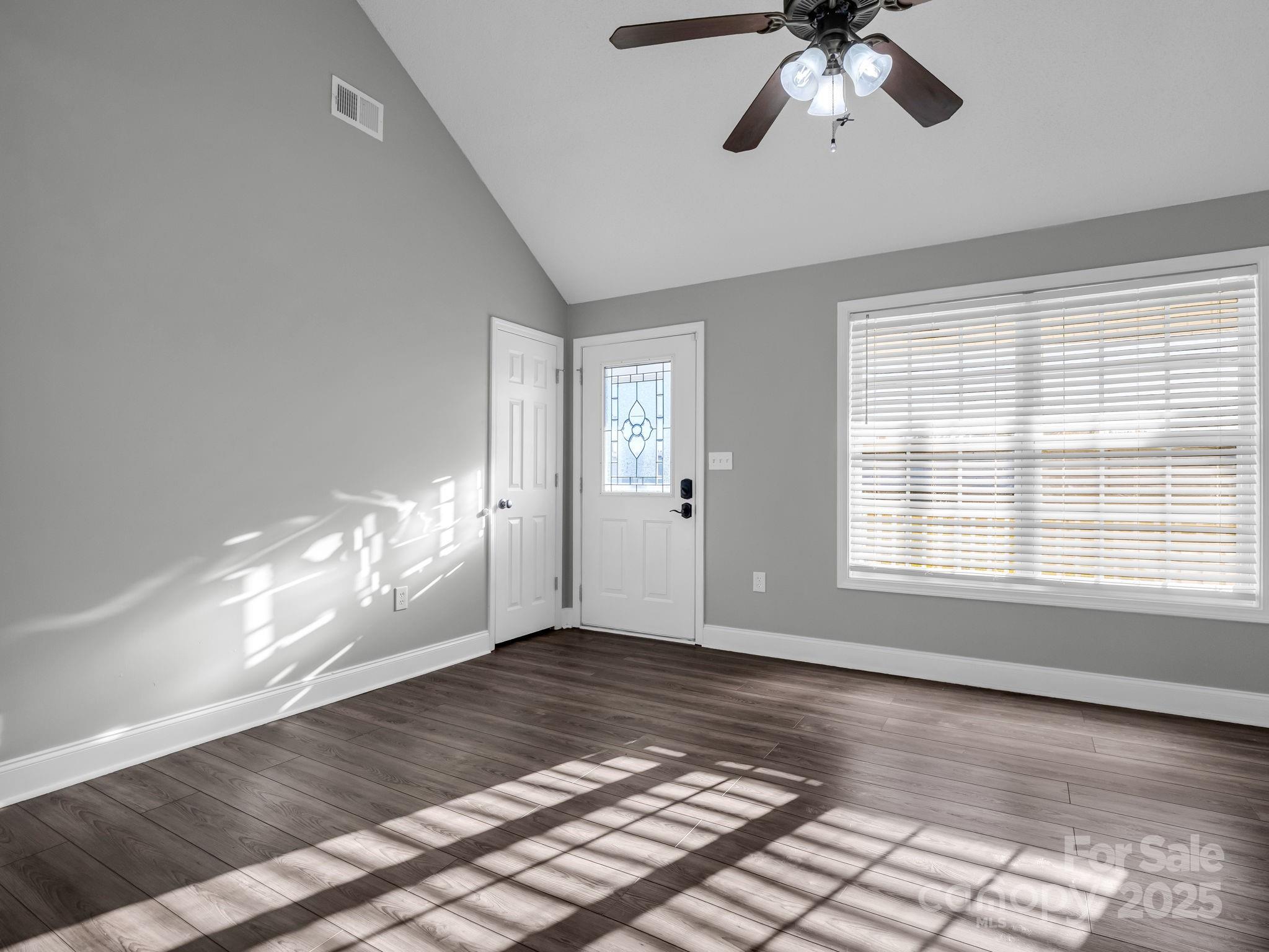 340 Sarratt Creek Road Gaffney, SC 29341 - Photo 33 of 46 a view of an empty room with window and chandelier fan