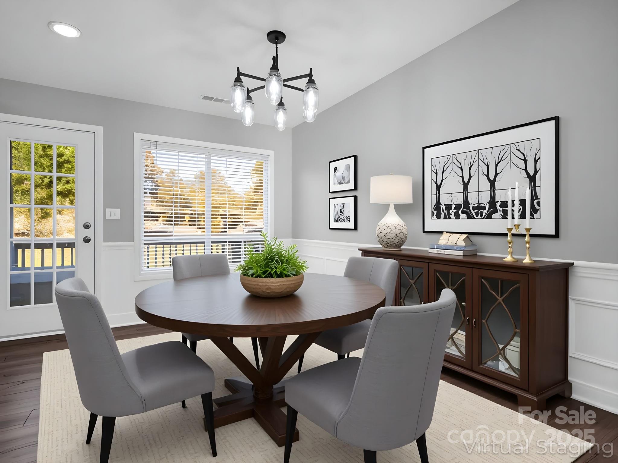 340 Sarratt Creek Road Gaffney, SC 29341 - Photo 6 of 46 a view of a dining room with furniture window and wooden floor