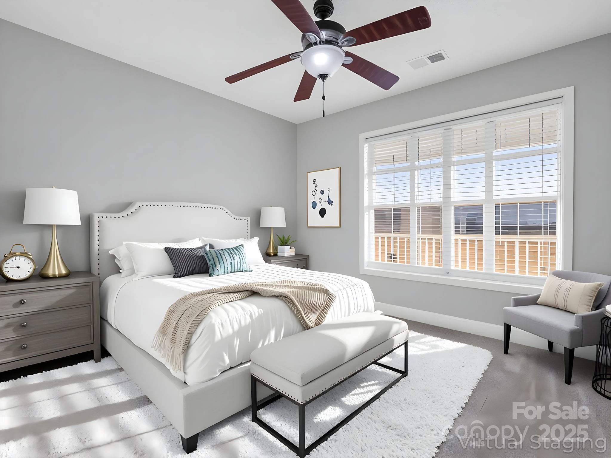 340 Sarratt Creek Road Gaffney, SC 29341 - Photo 7 of 46 a spacious bedroom with a bed a couch and a large window