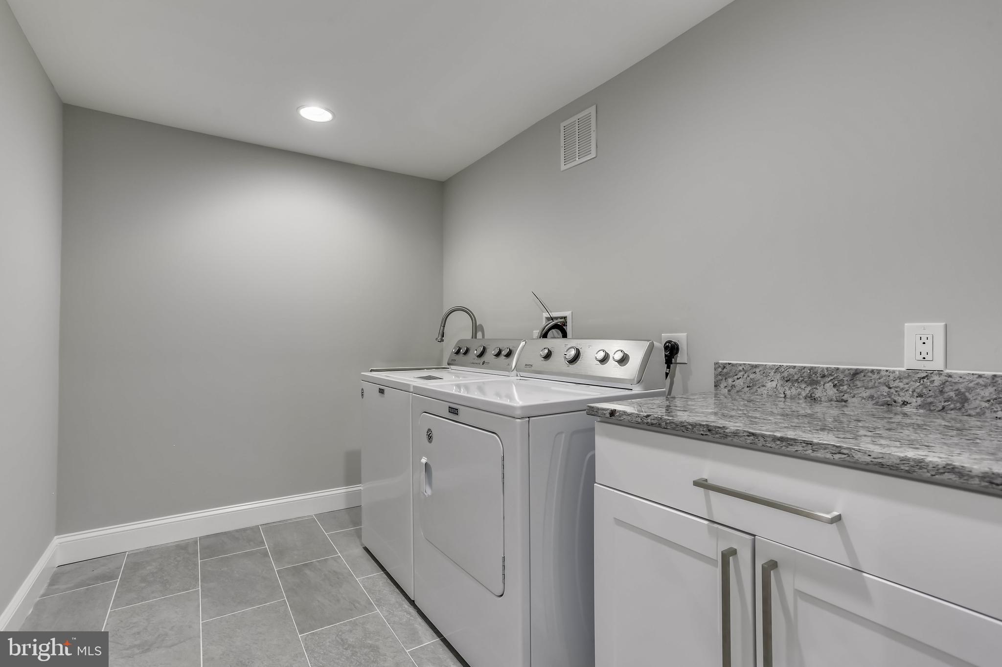 1948 Seminary Road Silver Spring, MD 20910 - Photo 44 of 48 Sink and storage in laundry room