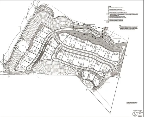 a black and white photo of a living room