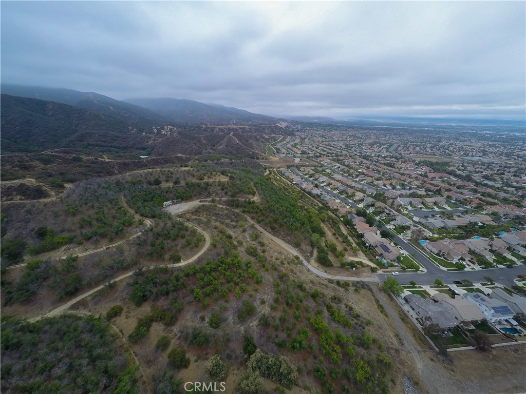 3933 Malaga Street Corona, CA 92882 - Photo 6 of 18 an aerial view of residential house with green space
