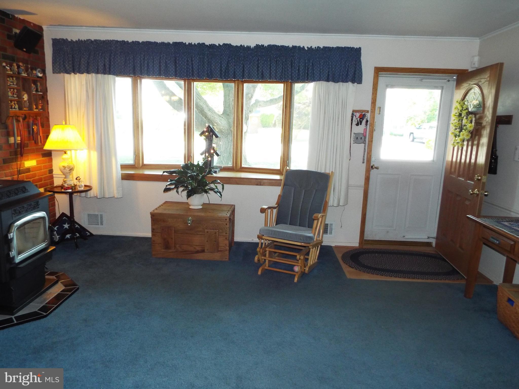 5956 Hunt Club Road Elkridge, MD 21075 - Photo 5 of 30 Living Room with Pellet Stove & Bay Window