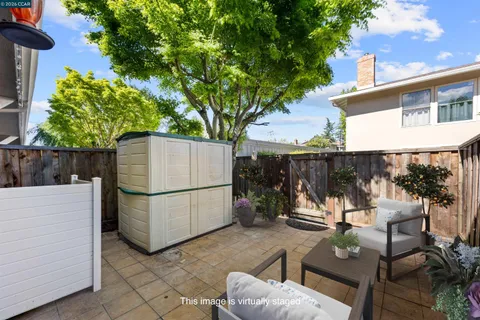 a view of outdoor space with wooden fence