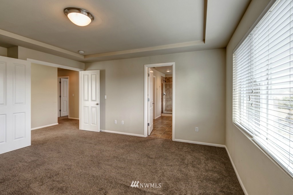 16123 35th Drive Southeast Bothell, WA 98012 - Photo 5 of 13 a view of an empty room with a window