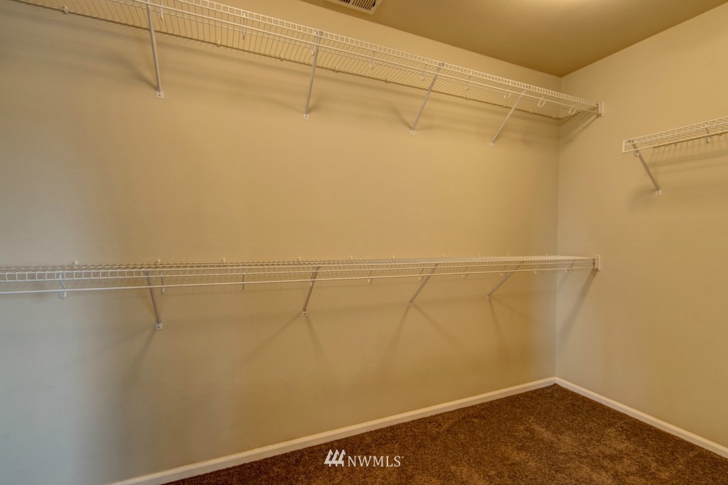 16123 35th Drive Southeast Bothell, WA 98012 - Photo 7 of 13 a view of a room with racks on the wall