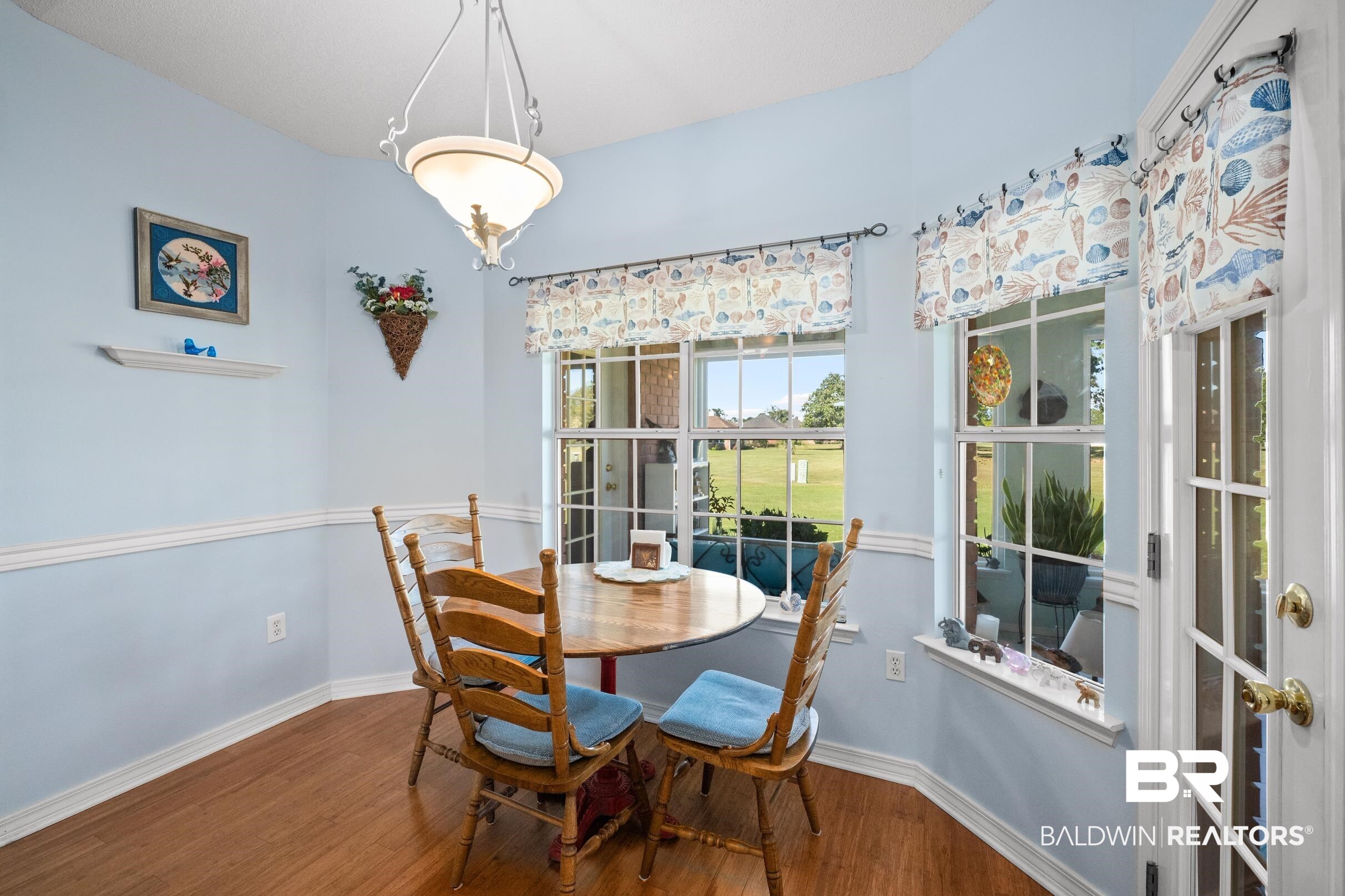 22355 East County Road 12 Foley, AL 36535 - Photo 19 of 54 Dining room featuring dark wood-style flooring and baseboards