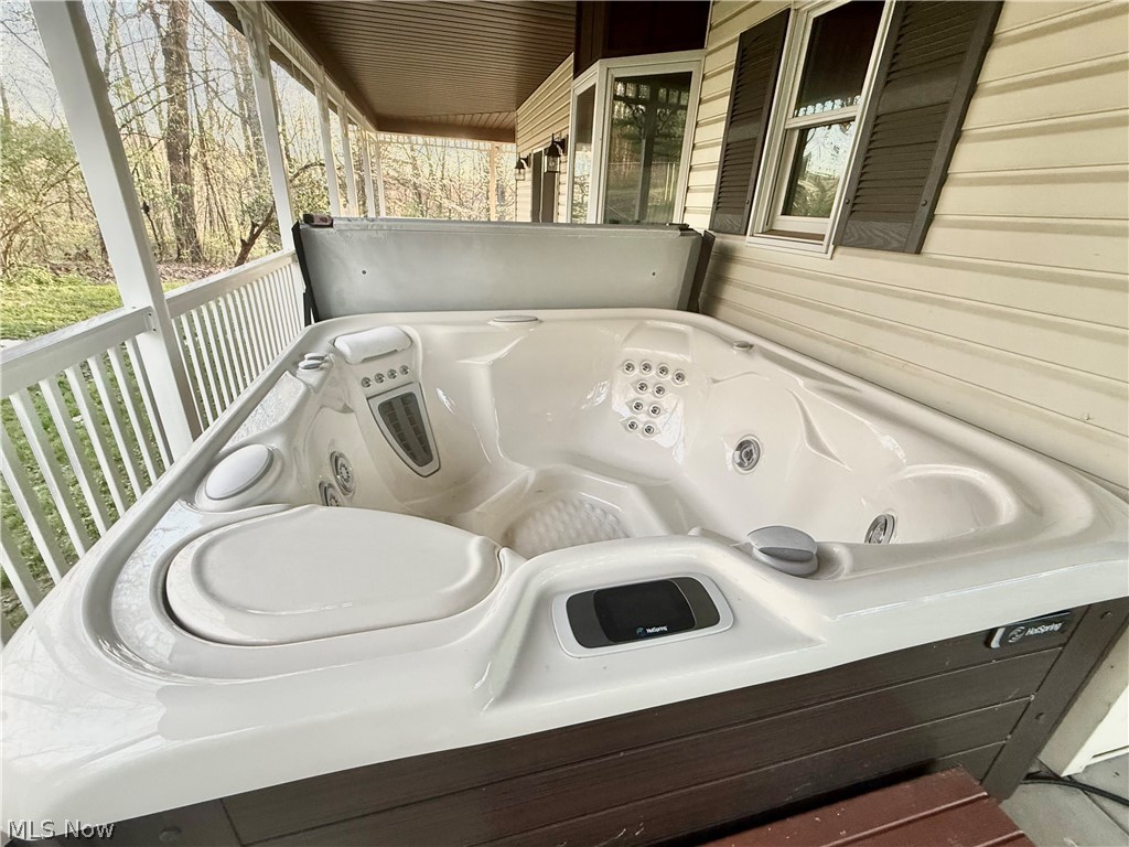 5042 Shawnee Road Carrollton, OH 44615 - Photo 41 of 48 hot tub on porch