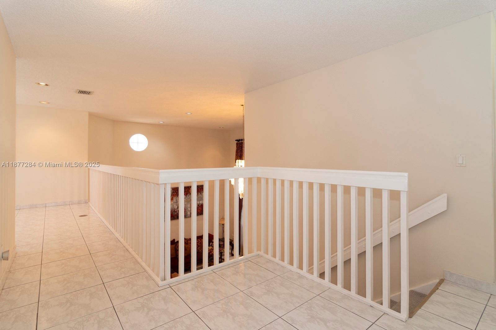 2293 Southwest 182nd Way Miramar, FL 33029 - Photo 26 of 41 a view of staircase with white walls