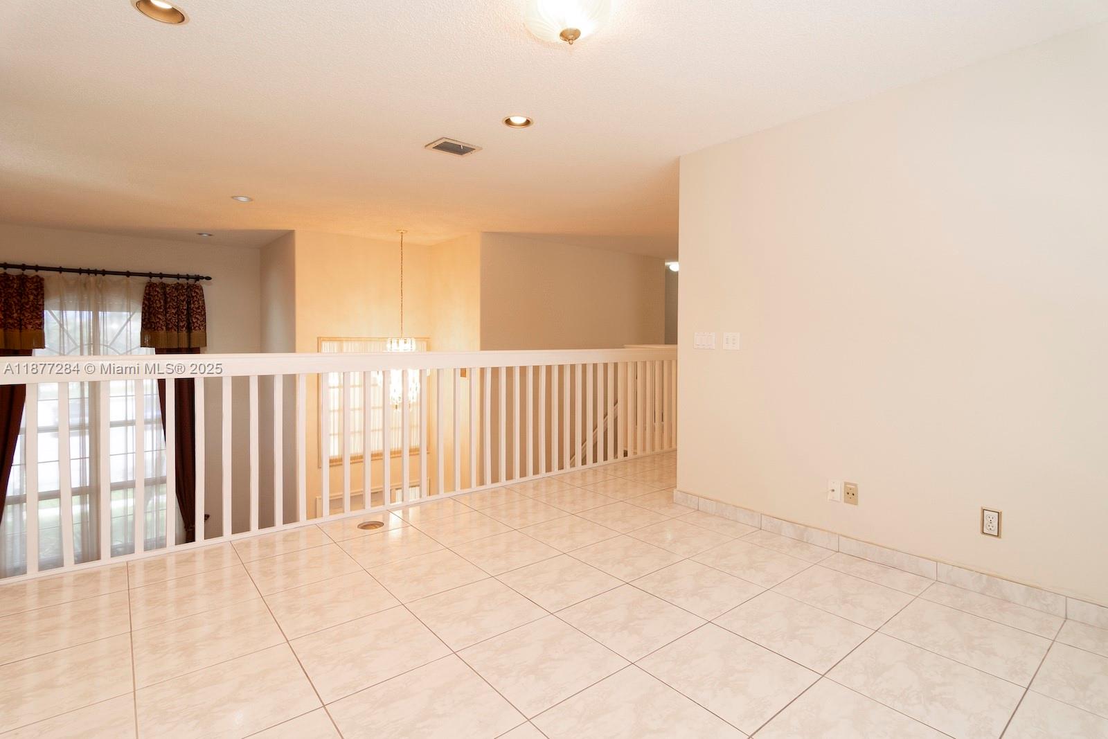 2293 Southwest 182nd Way Miramar, FL 33029 - Photo 27 of 41 a view of a room with stairs