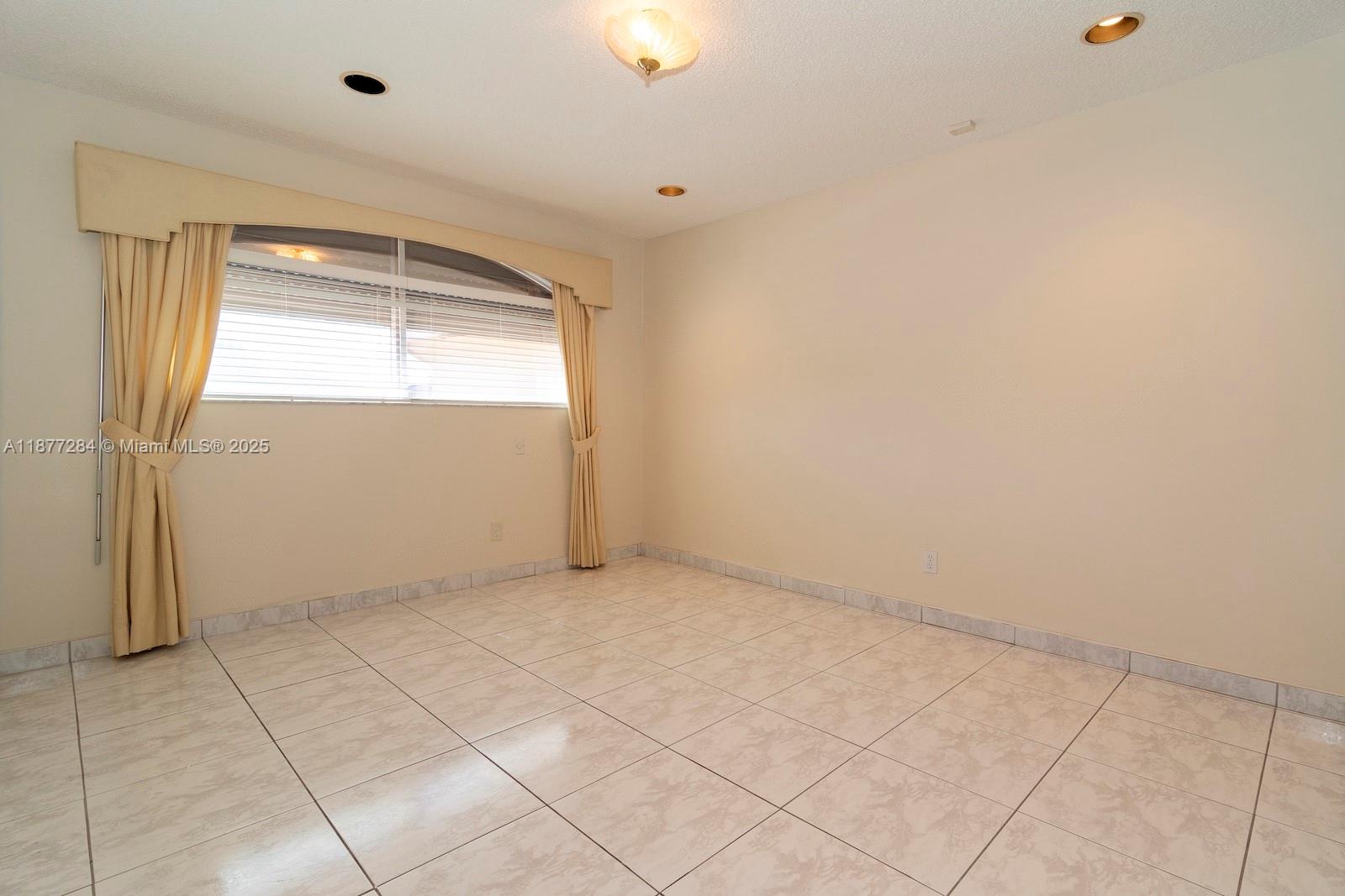 2293 Southwest 182nd Way Miramar, FL 33029 - Photo 28 of 41 an empty room with windows
