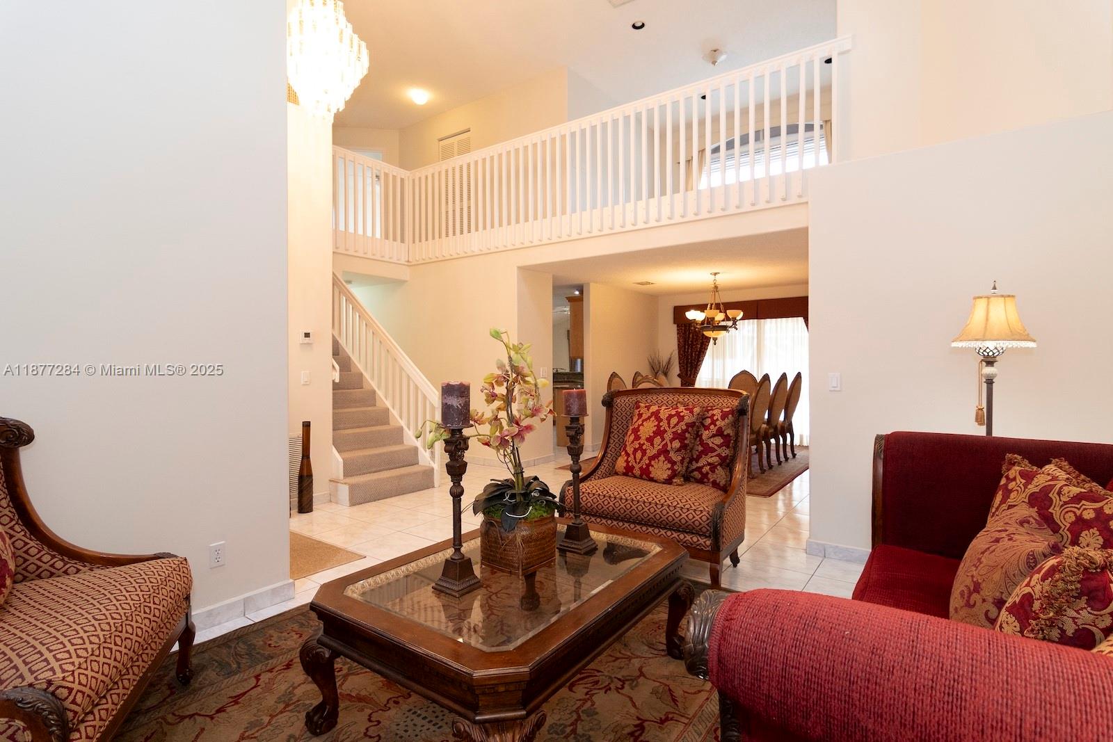 2293 Southwest 182nd Way Miramar, FL 33029 - Photo 6 of 41 a living room with furniture and a table