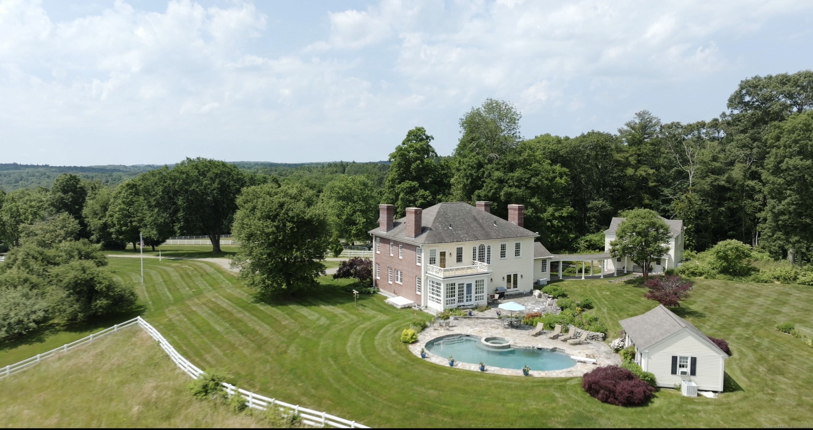 Welcome to South Hill Farm! Stunning Georgian Colonial estate situated on 55 hilltop acres in Woodstock, CT.