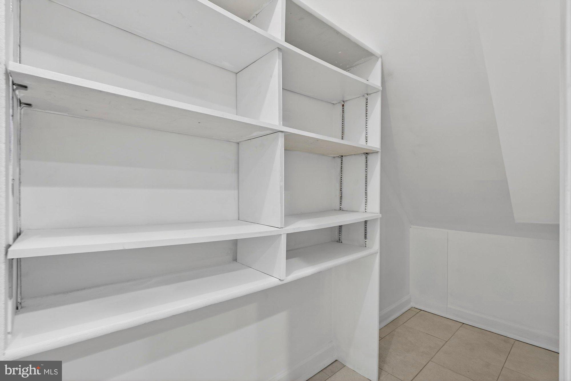 207 Park Street Vienna, VA 22180 - Photo 23 of 45 a view of an empty walk in closet
