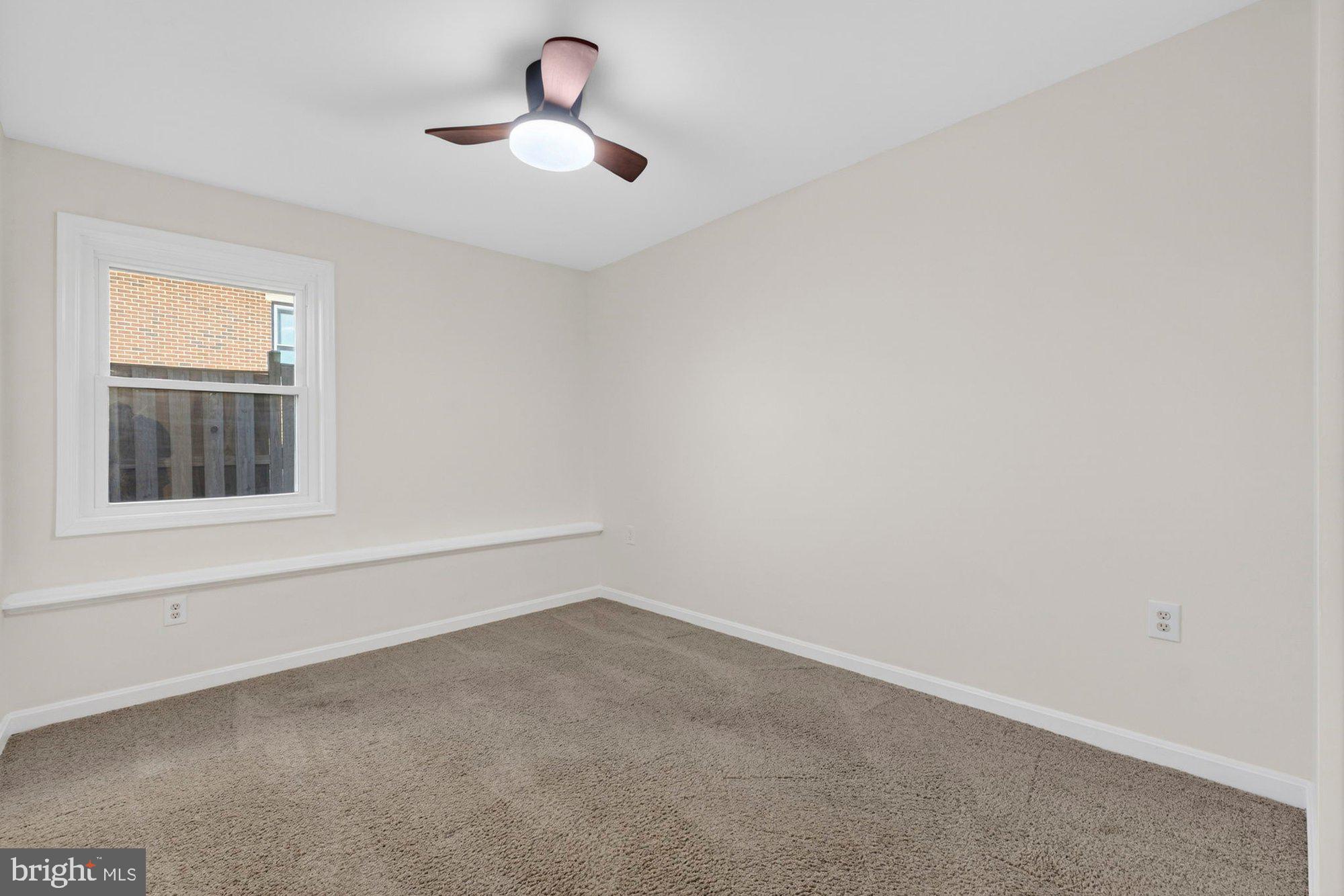207 Park Street Vienna, VA 22180 - Photo 30 of 45 a view of an empty room with a window