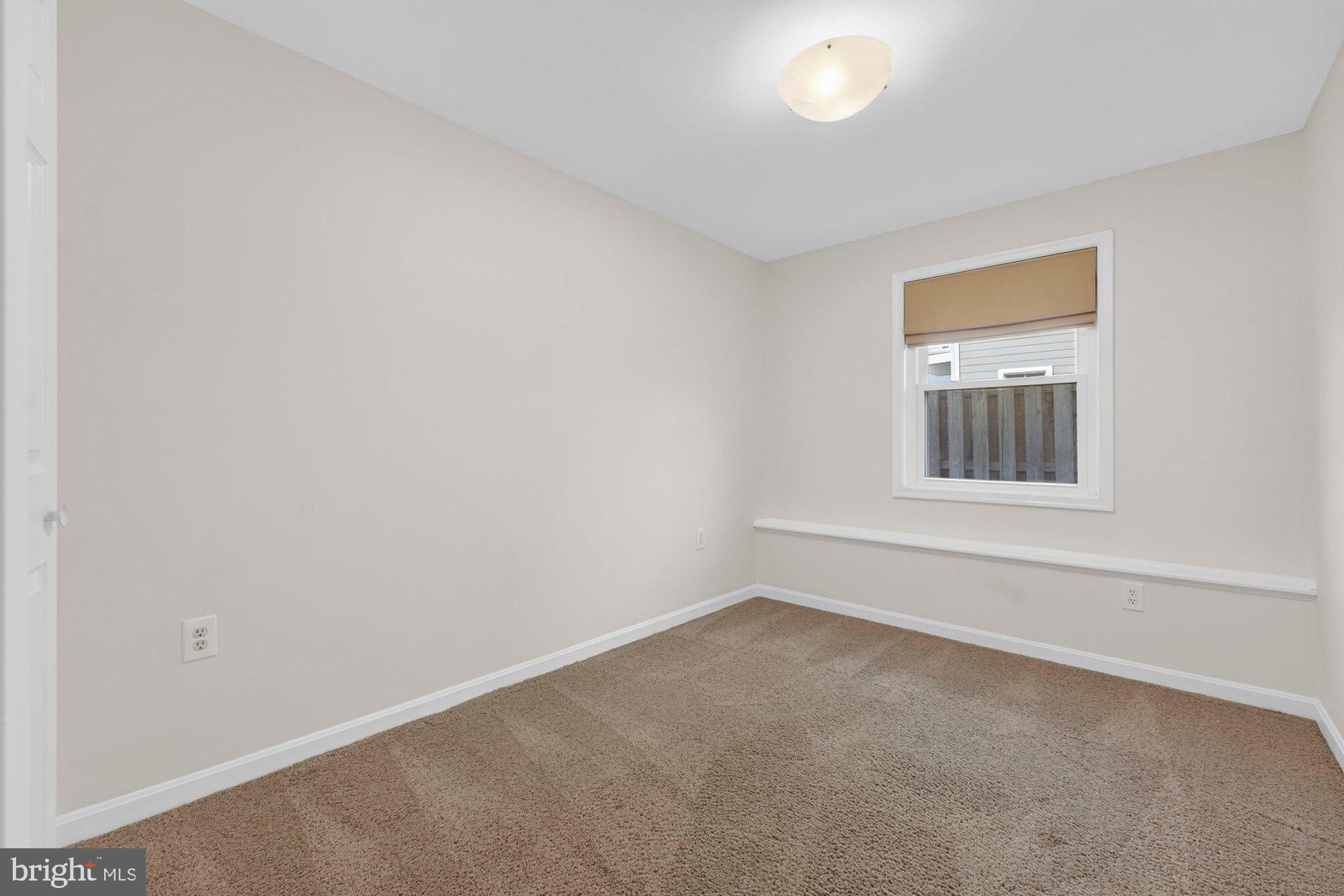 207 Park Street Vienna, VA 22180 - Photo 31 of 45 an empty room with a window