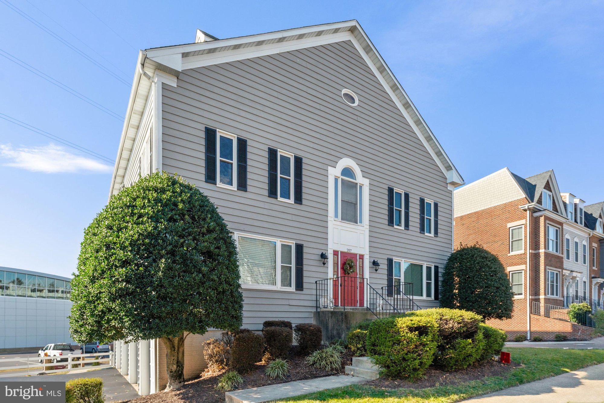 207 Park Street Vienna, VA 22180 - Photo 43 of 45 a front view of a house with a garden