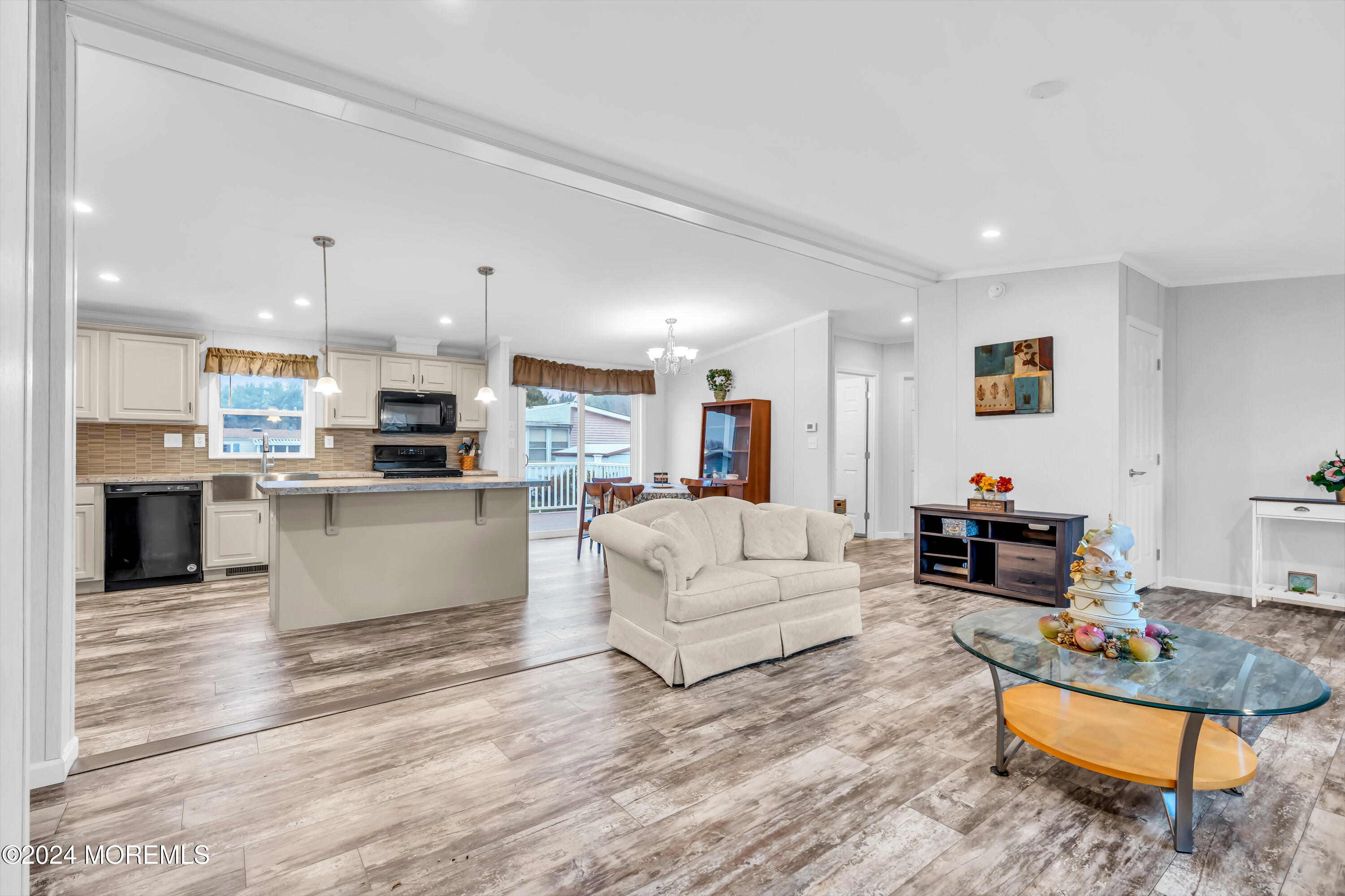602 Jerome Place Freehold, NJ 07728 - Photo 12 of 55 a living room with furniture and kitchen view