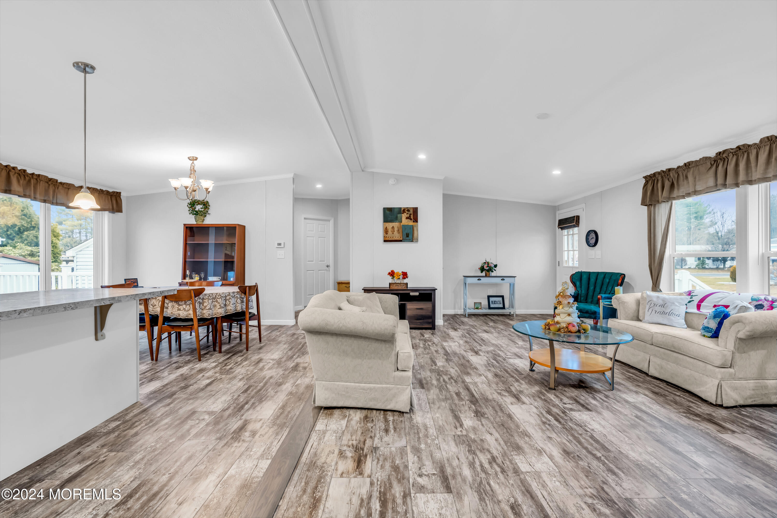 602 Jerome Place Freehold, NJ 07728 - Photo 13 of 55 a living room with furniture and a wooden floor