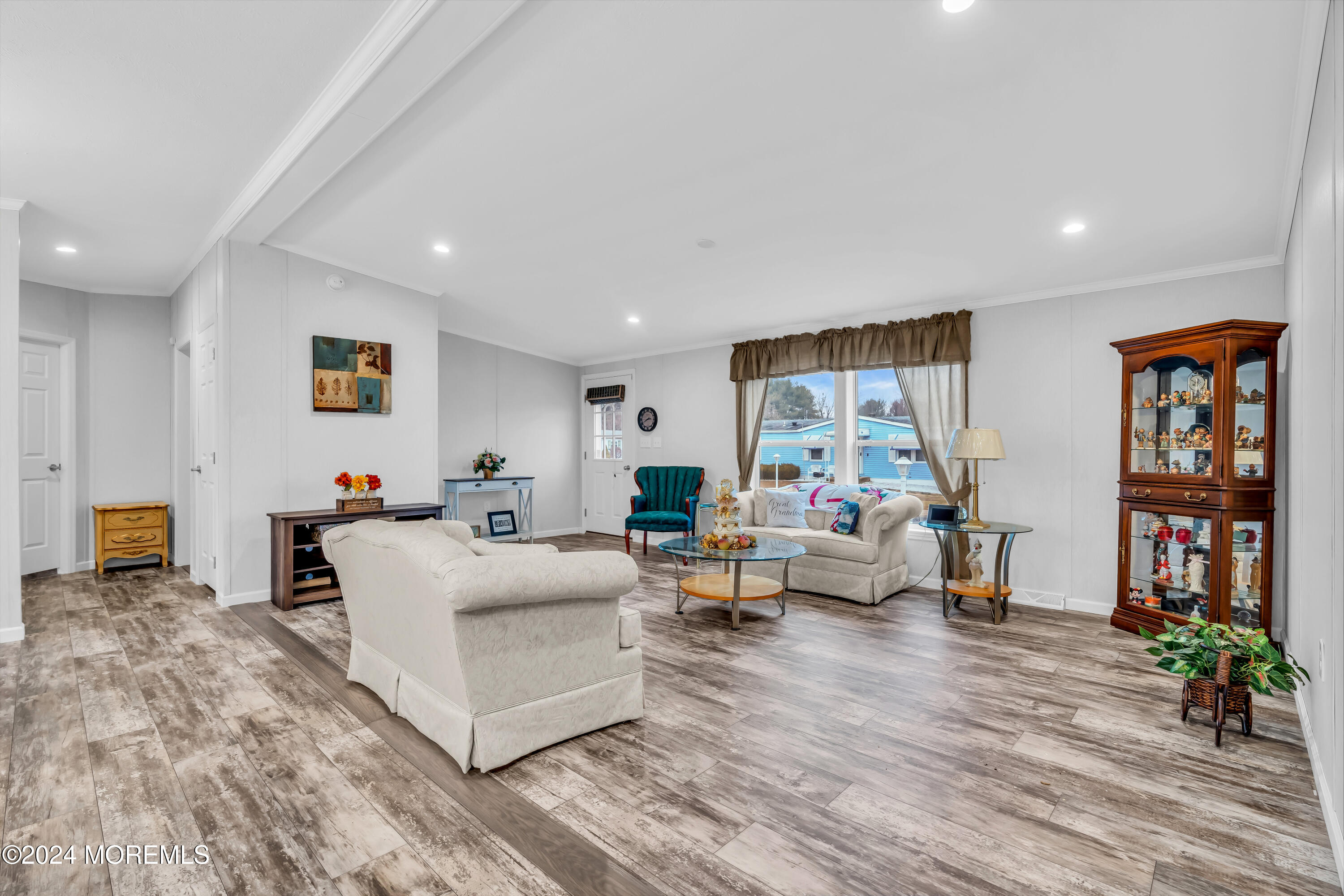 602 Jerome Place Freehold, NJ 07728 - Photo 14 of 55 a living room with furniture and wooden floor