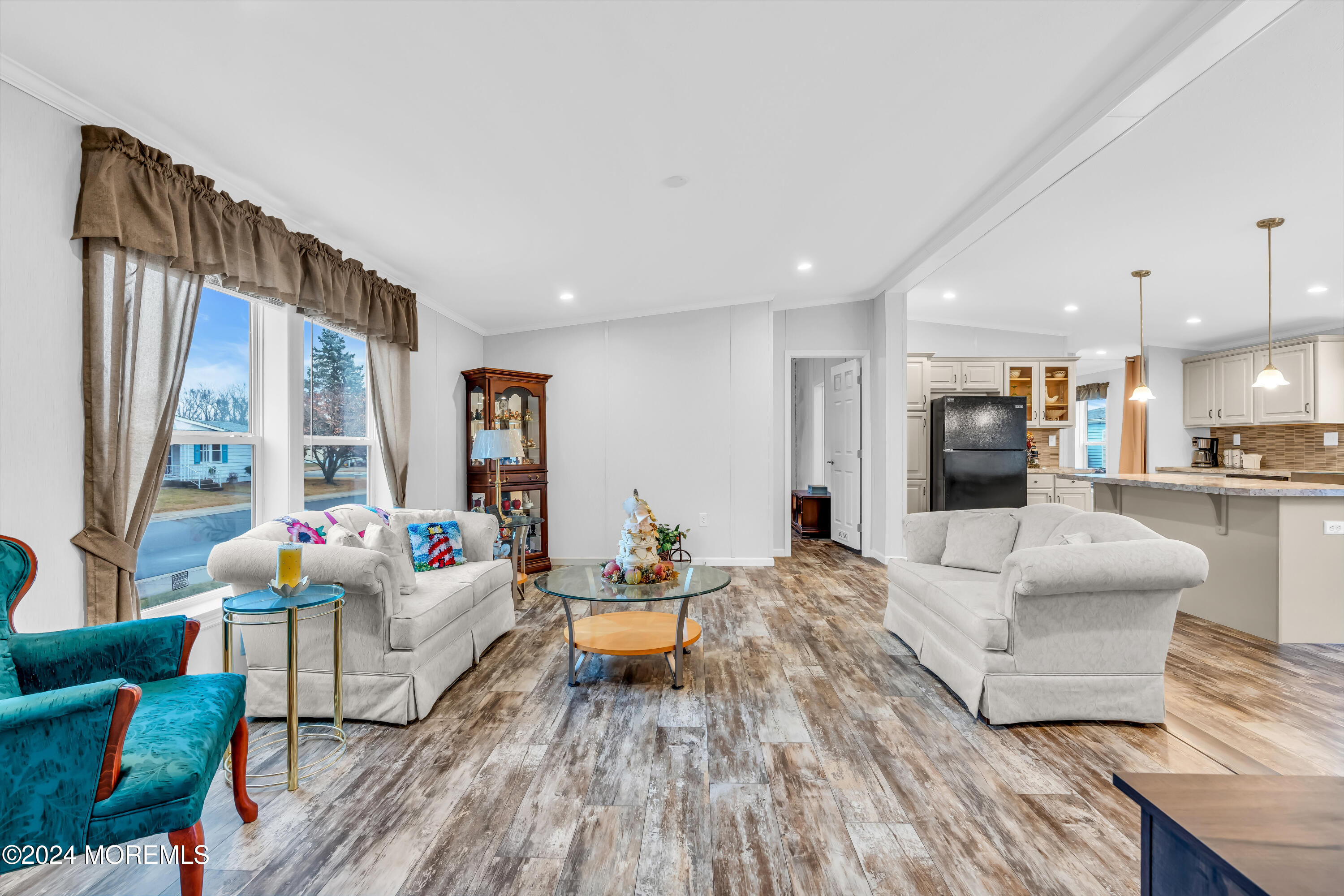602 Jerome Place Freehold, NJ 07728 - Photo 16 of 55 a living room with furniture and large windows