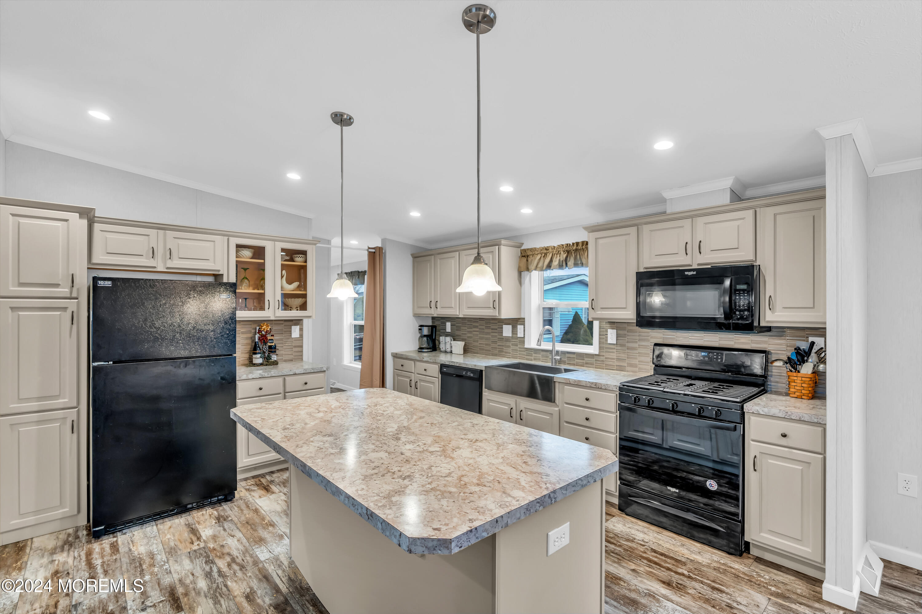 602 Jerome Place Freehold, NJ 07728 - Photo 22 of 55 a kitchen with kitchen island granite countertop stainless steel appliances and refrigerator