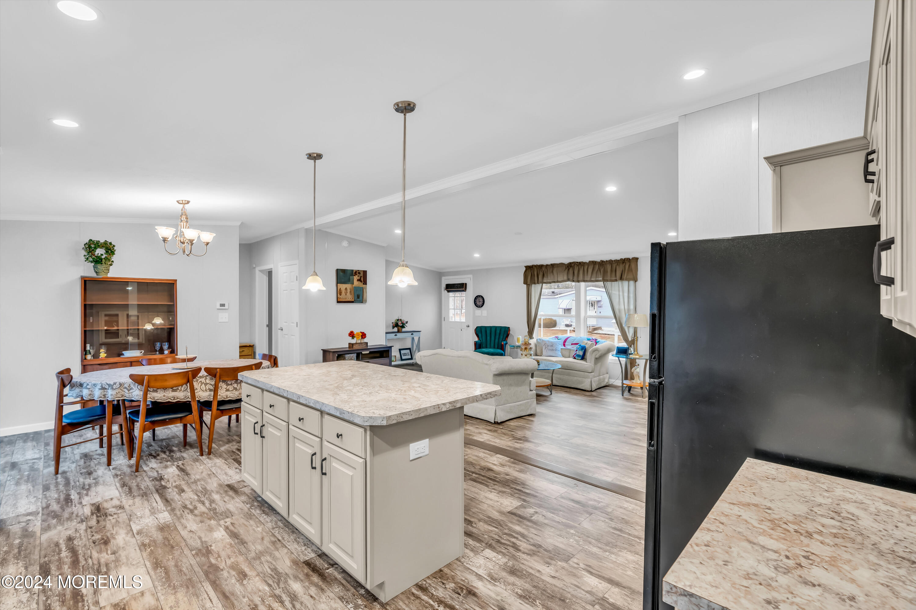 602 Jerome Place Freehold, NJ 07728 - Photo 27 of 55 a large kitchen with a table and chairs in it