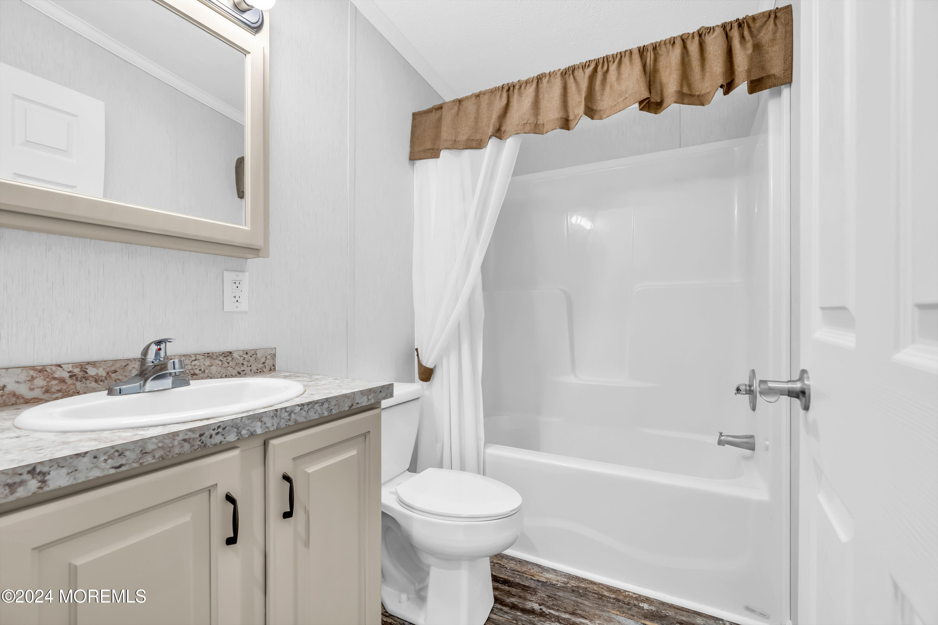 602 Jerome Place Freehold, NJ 07728 - Photo 33 of 55 a bathroom with a granite countertop sink toilet and shower