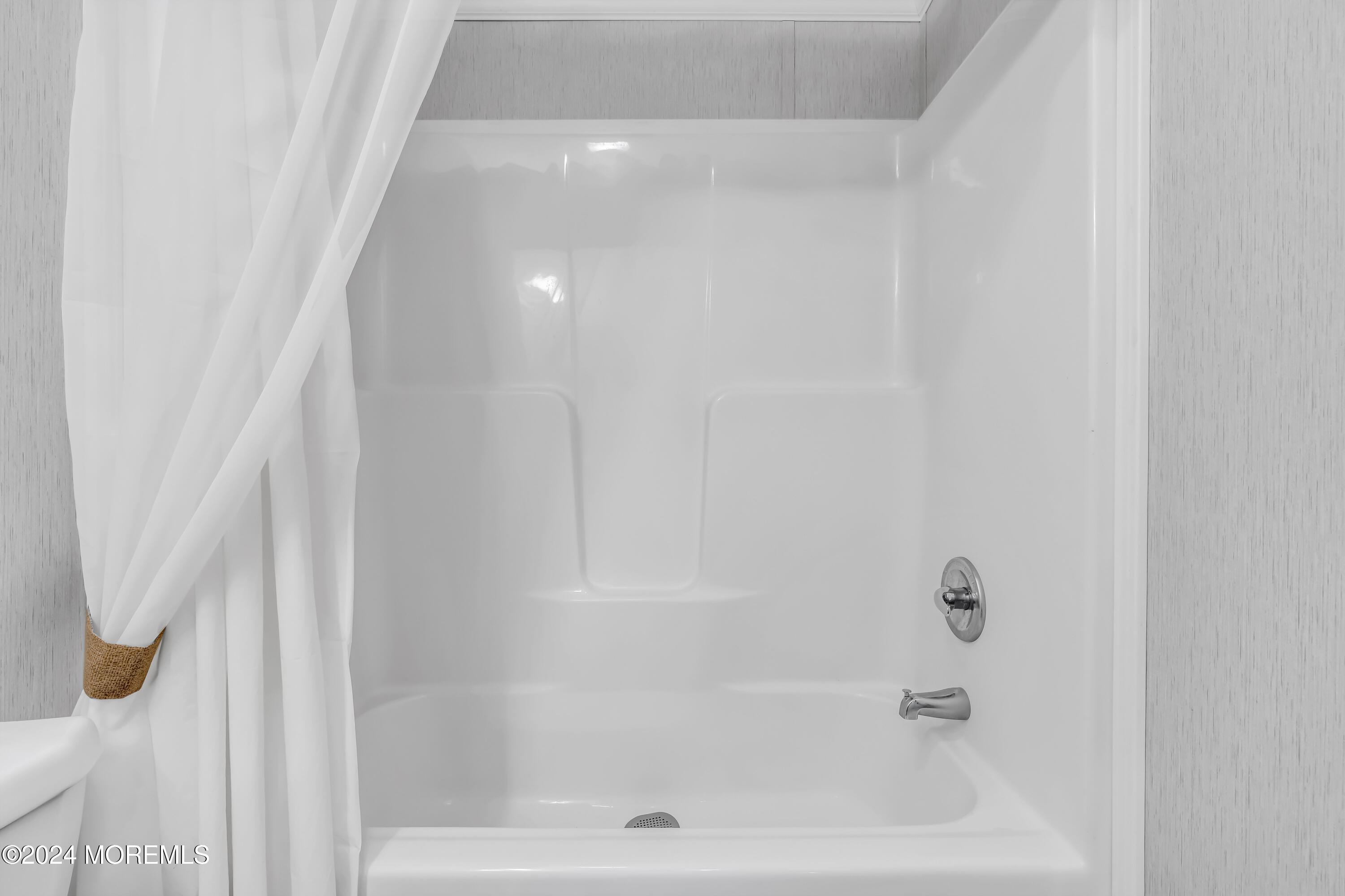 602 Jerome Place Freehold, NJ 07728 - Photo 34 of 55 a close up of a bathtub curtain