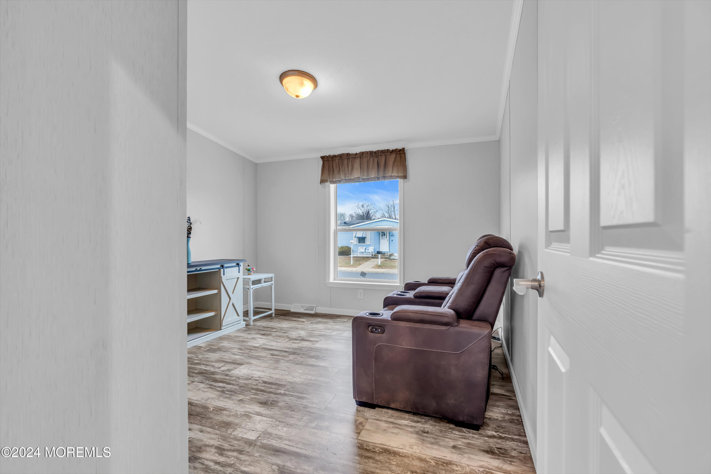 602 Jerome Place Freehold, NJ 07728 - Photo 35 of 55 a living room with furniture and a window