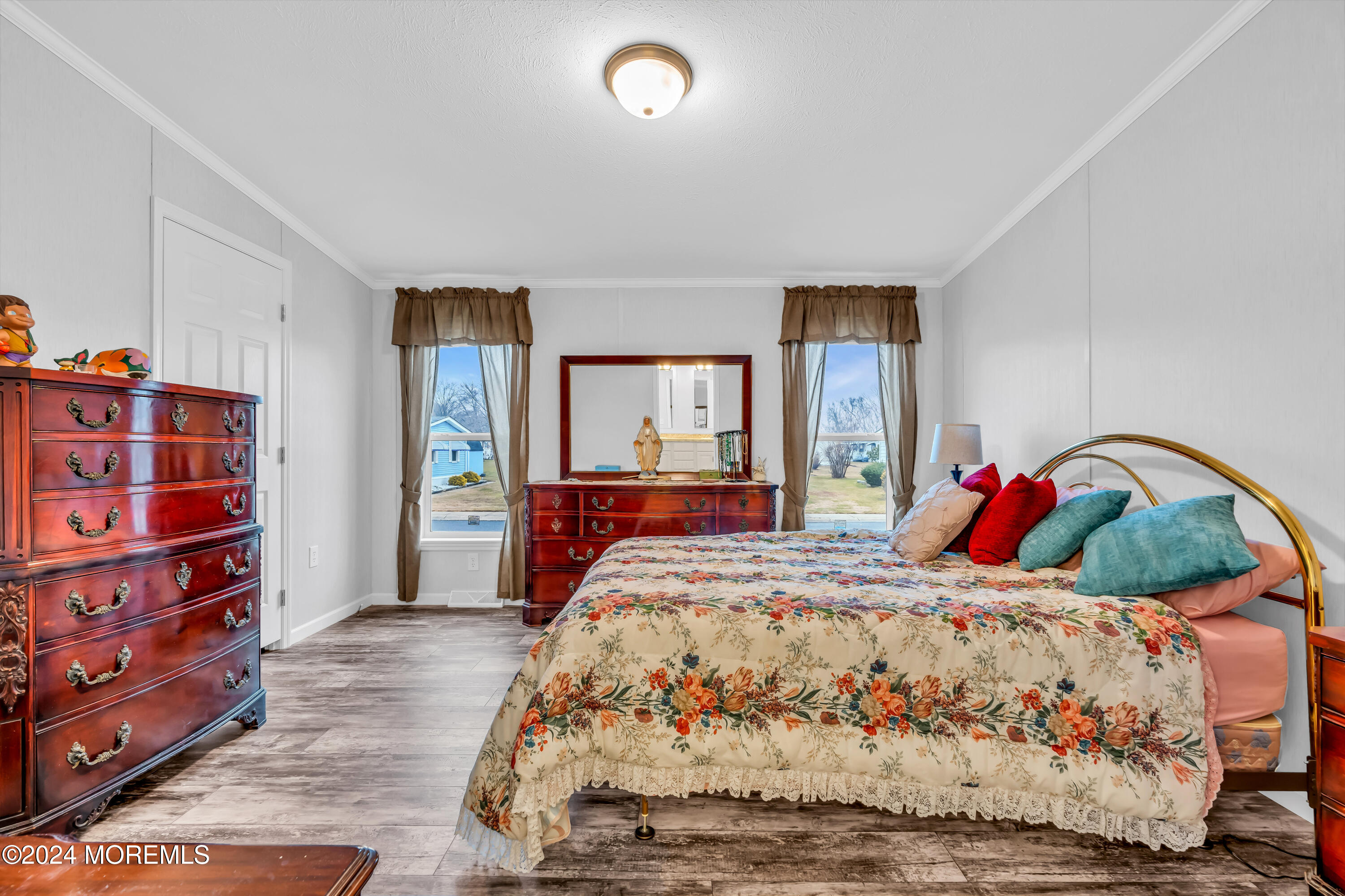 602 Jerome Place Freehold, NJ 07728 - Photo 40 of 55 a bedroom with a large bed and a dresser