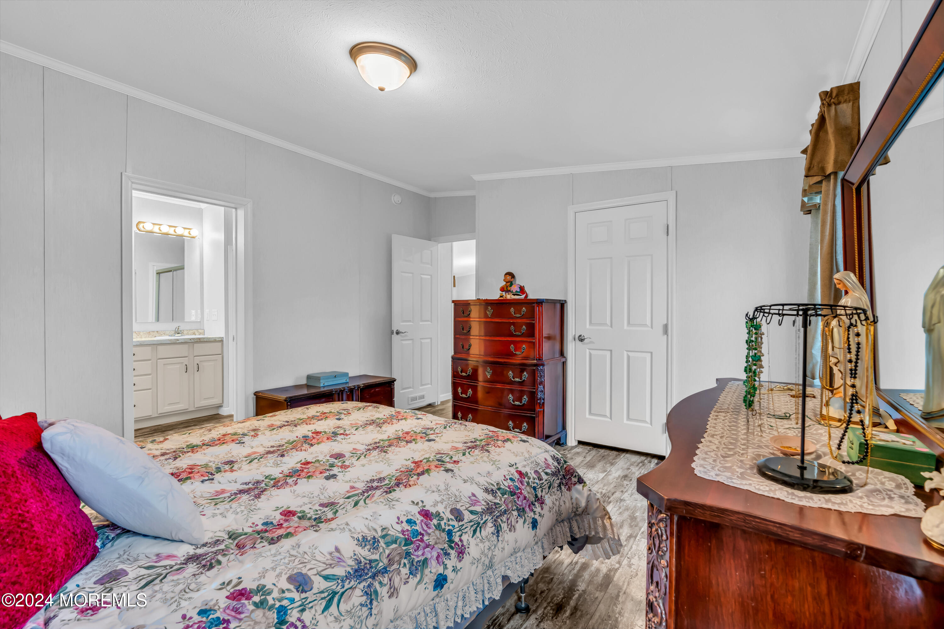 602 Jerome Place Freehold, NJ 07728 - Photo 41 of 55 a bedroom with a bed and a flat screen tv