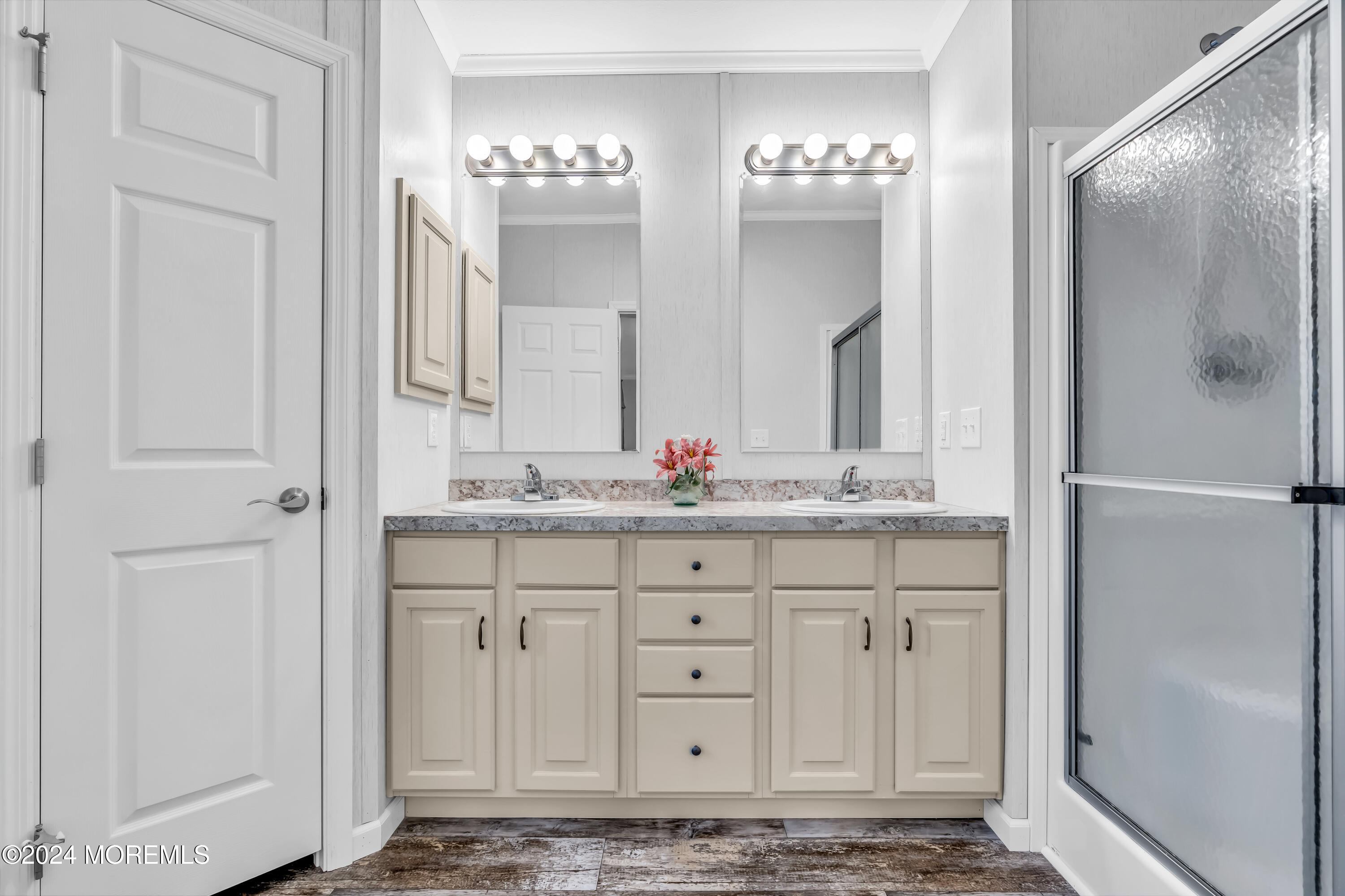 602 Jerome Place Freehold, NJ 07728 - Photo 42 of 55 a bathroom with double vanity sinks and a shower