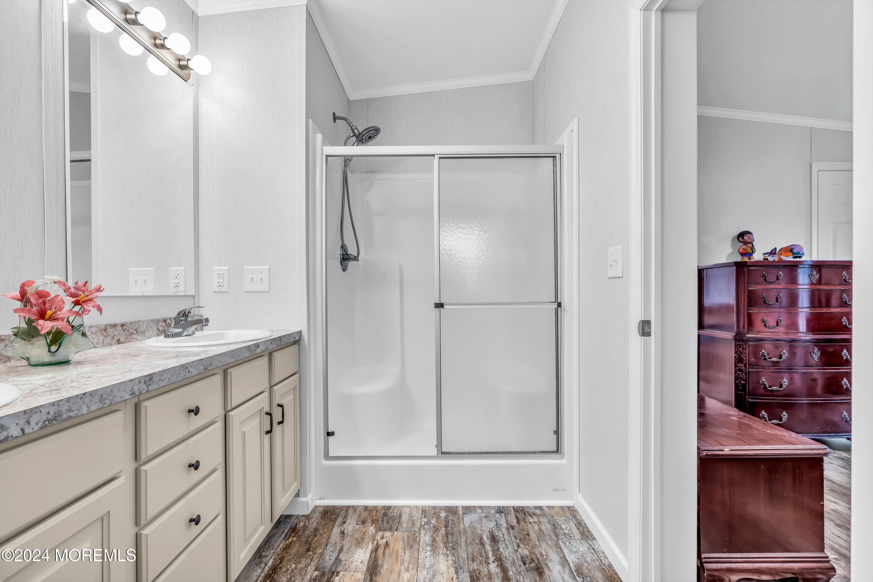 602 Jerome Place Freehold, NJ 07728 - Photo 43 of 55 a bathroom with a sink and a mirror