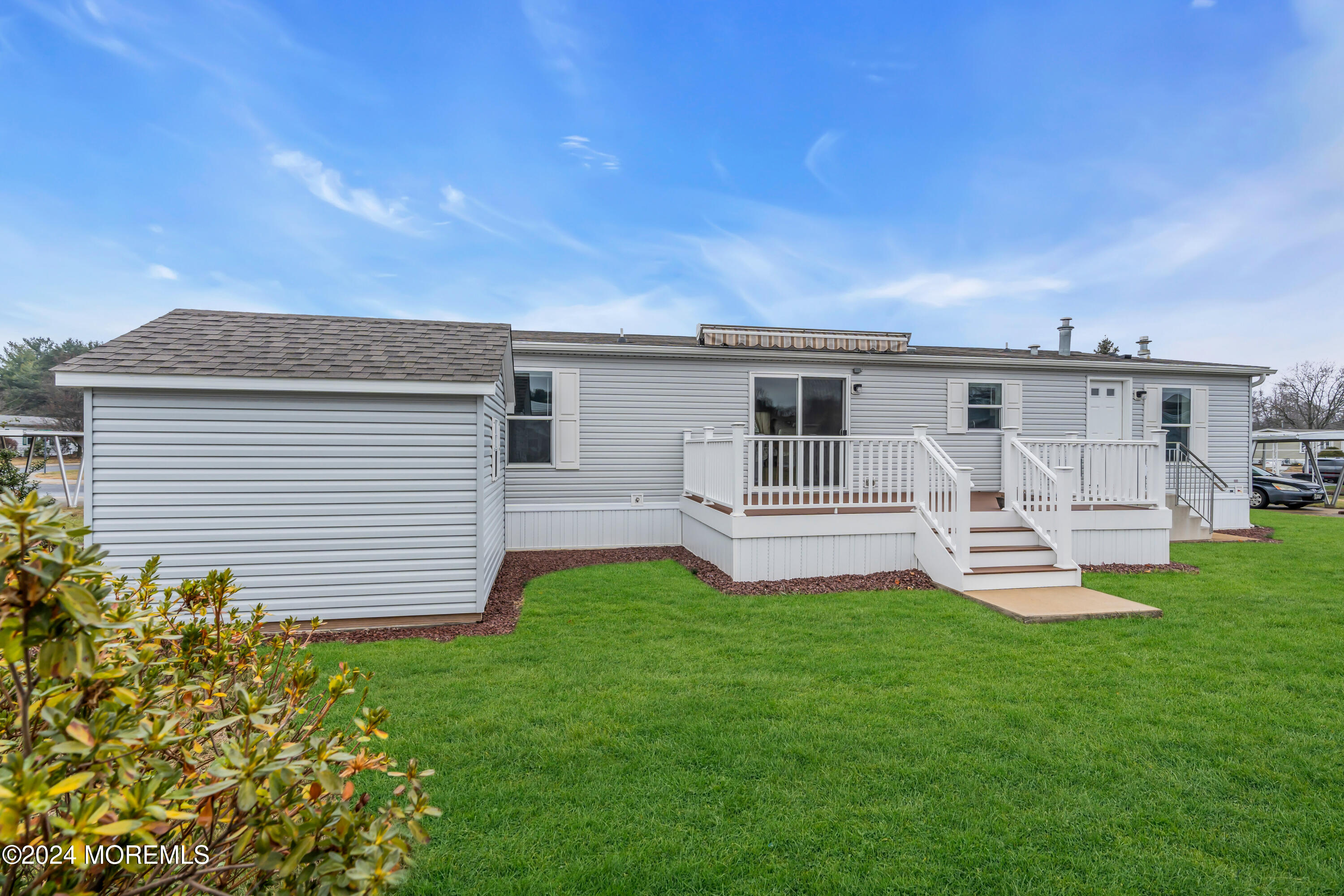 602 Jerome Place Freehold, NJ 07728 - Photo 47 of 55 a front view of a house with garden and porch