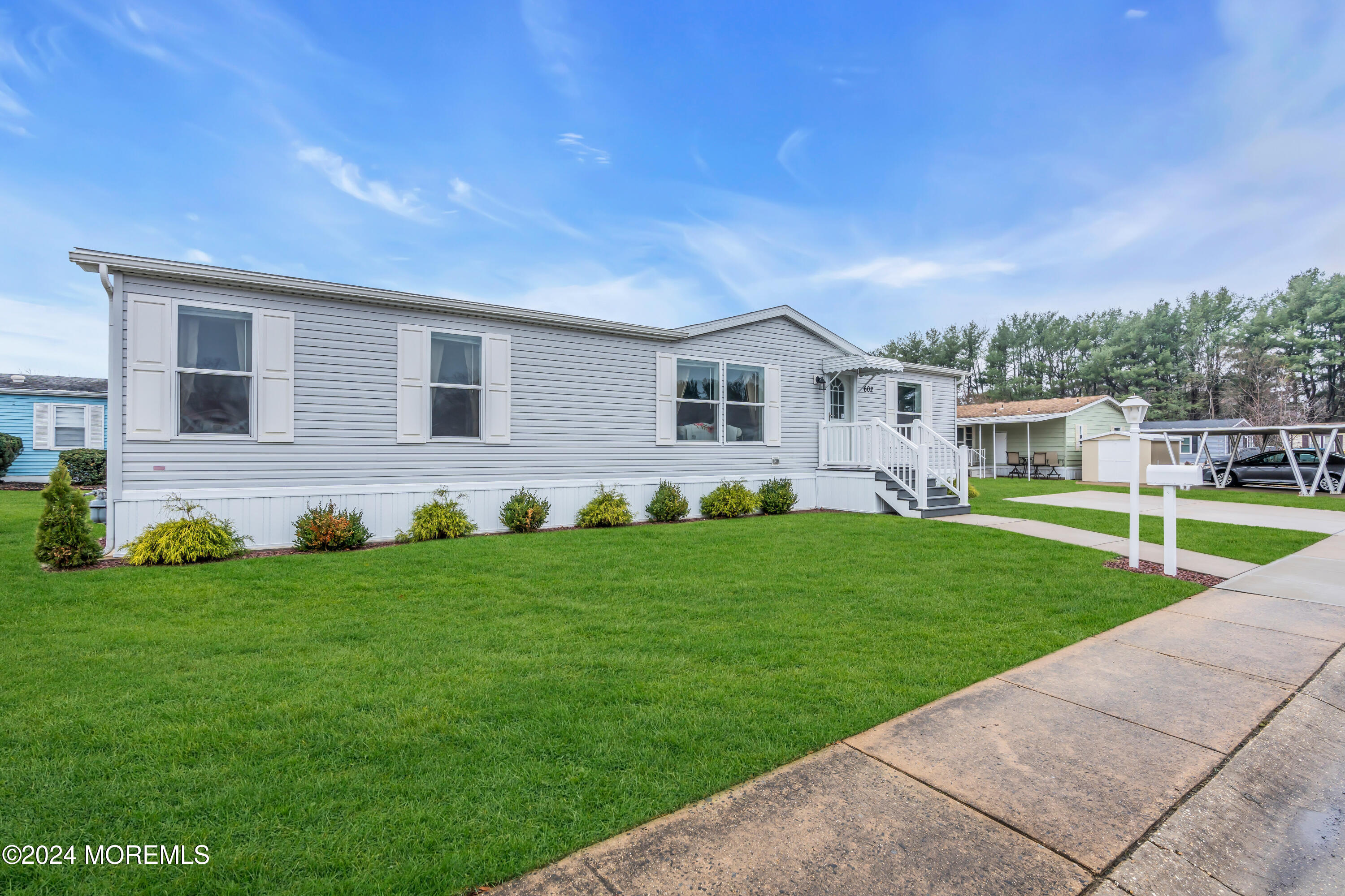 602 Jerome Place Freehold, NJ 07728 - Photo 5 of 55 a front view of house with yard and green space